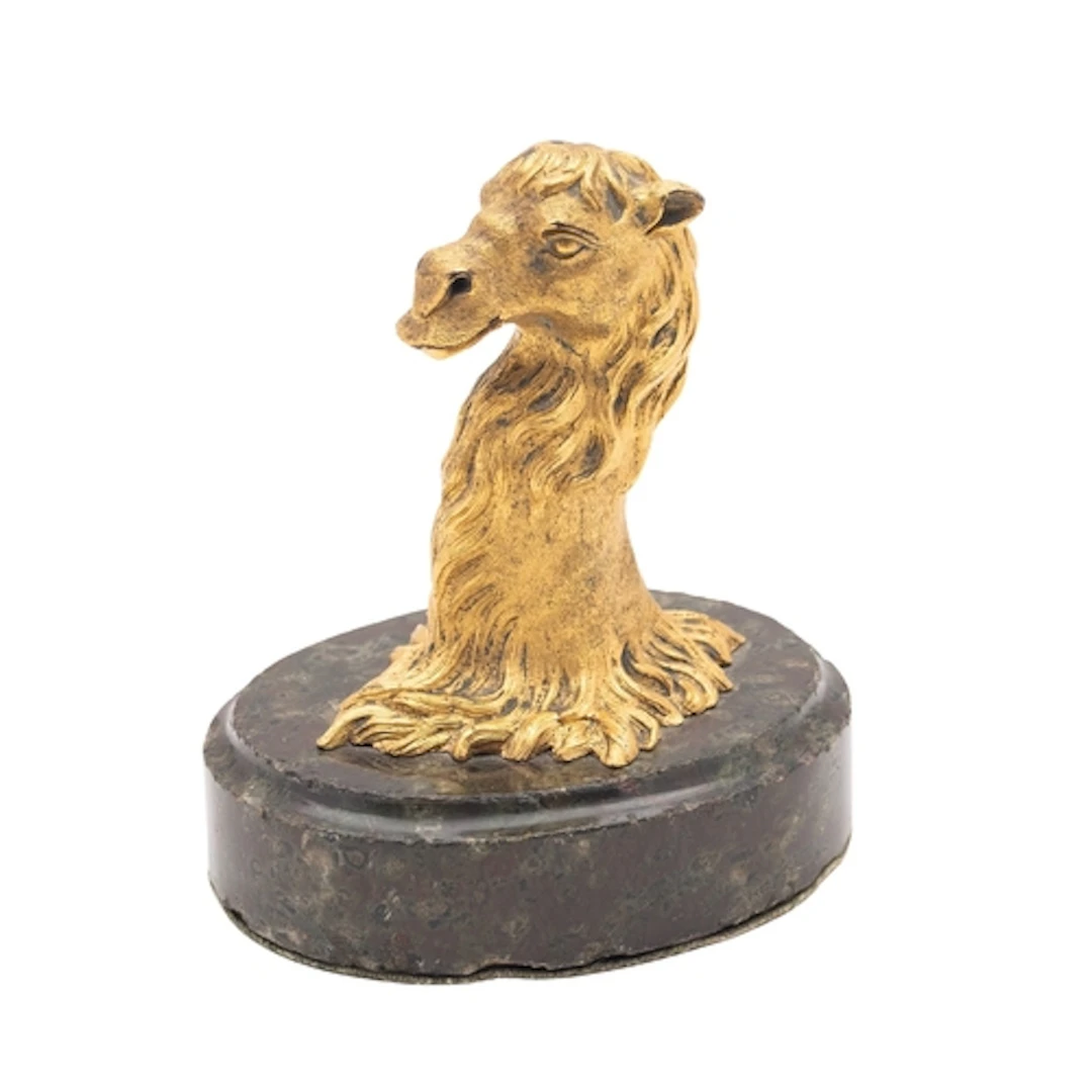 A gilt bronze and polished serpentine mounted desk weight ca...