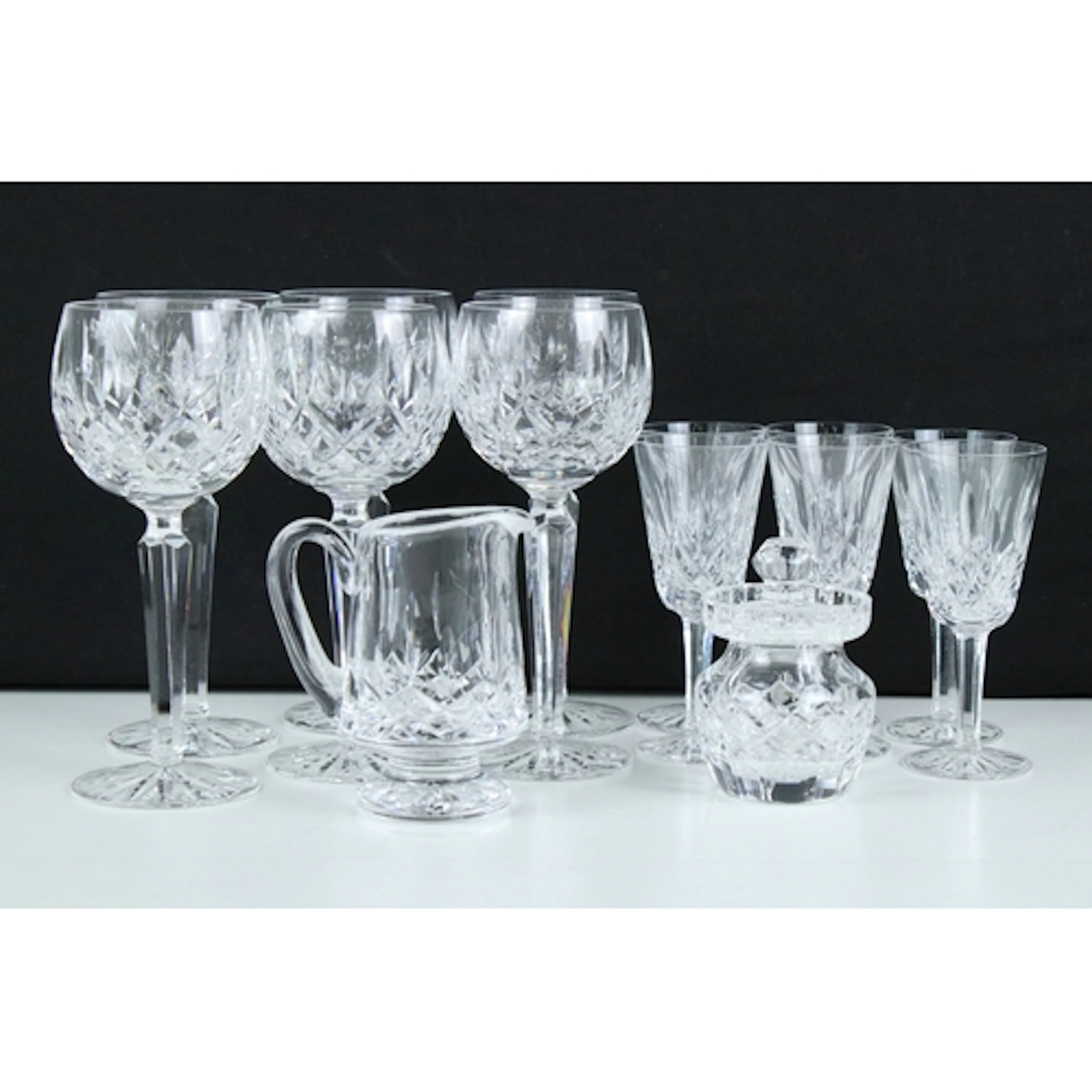 Waterford crystal glassware to include wine glasses, a foote...
