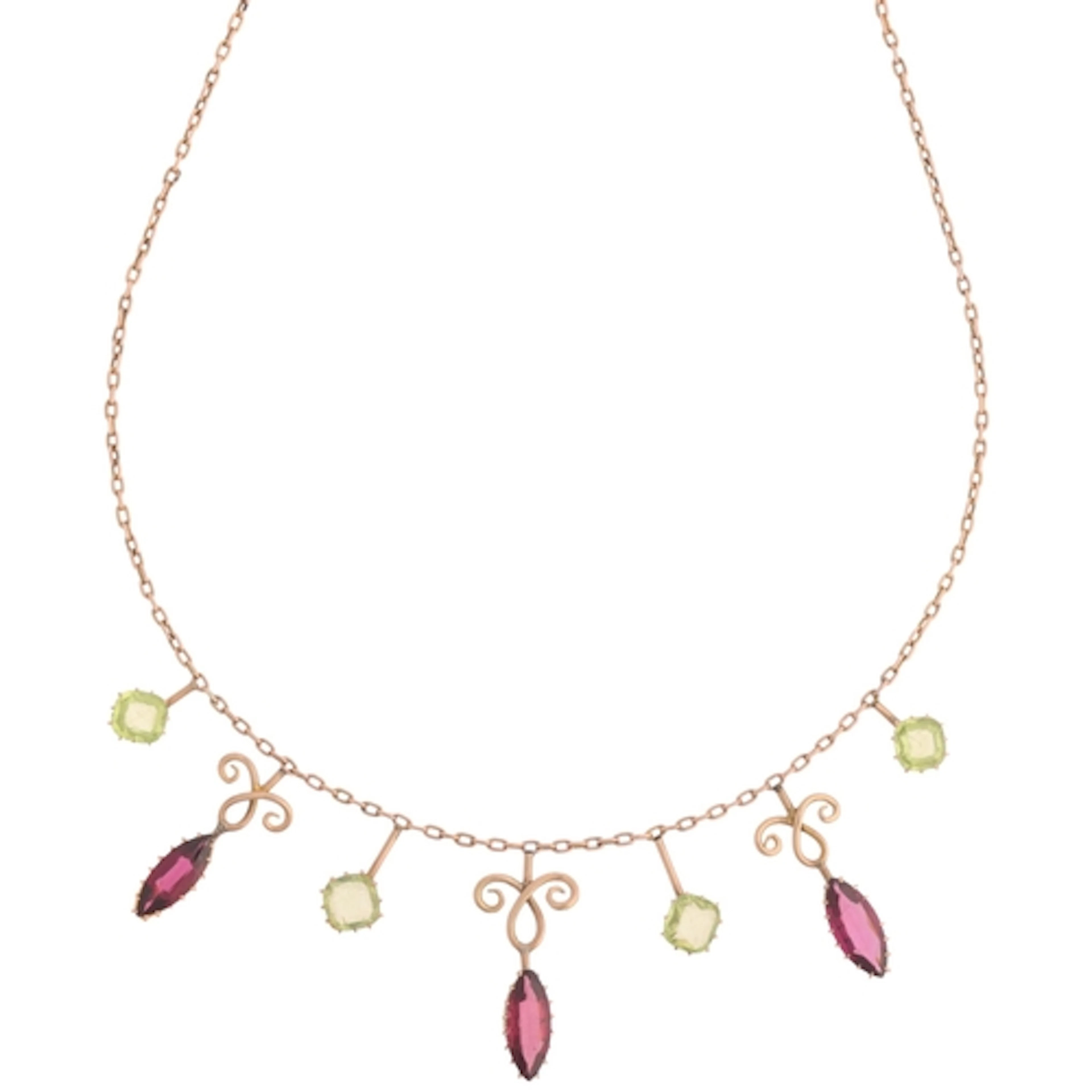 An Antique Edwardian 9ct gold garnet and peridot fringe neck...