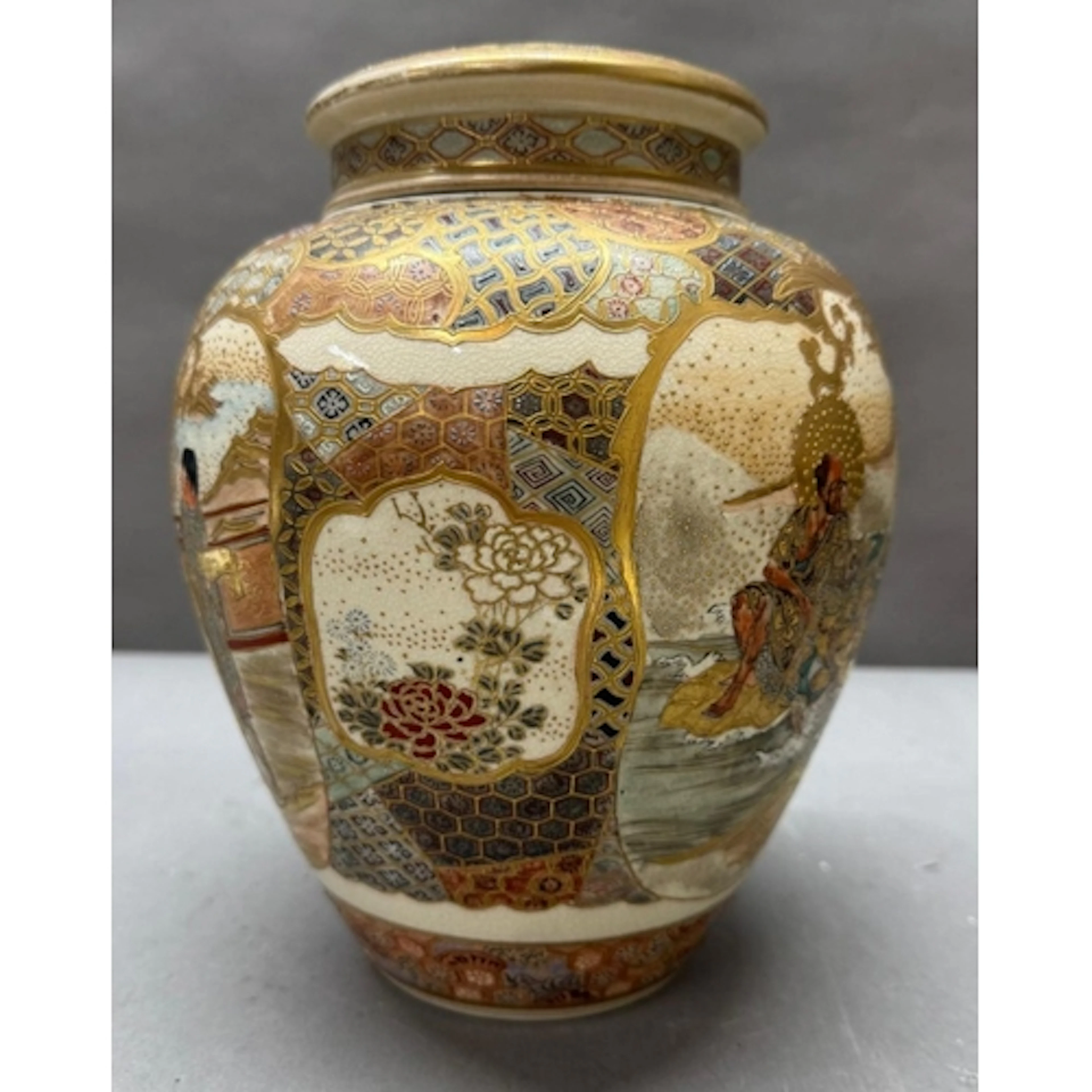 A Japanese satsuma pattern lidded ginger jar decorated with ...