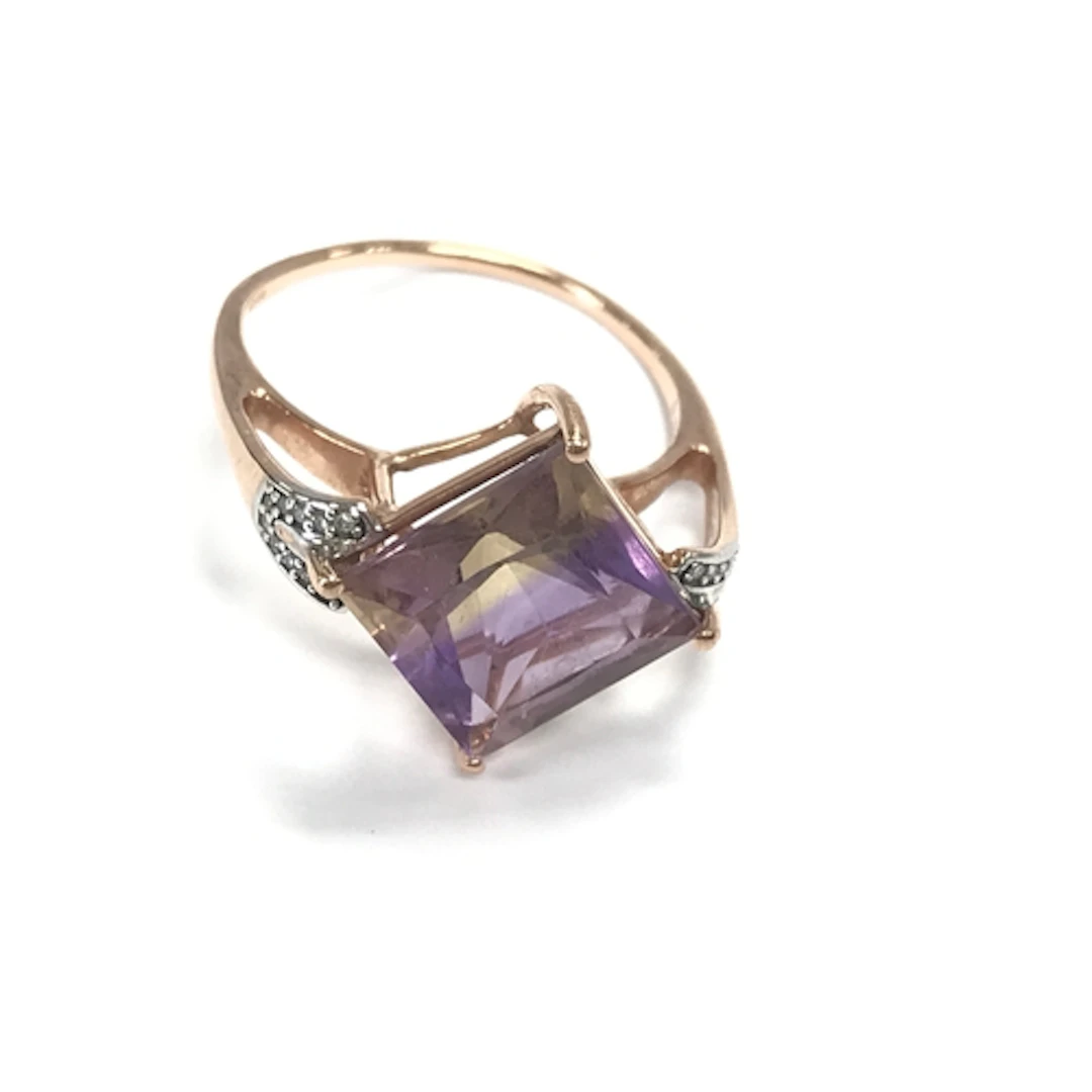 A 9ct rose gold Ametrine and diamond ring. Size S and 3.5g