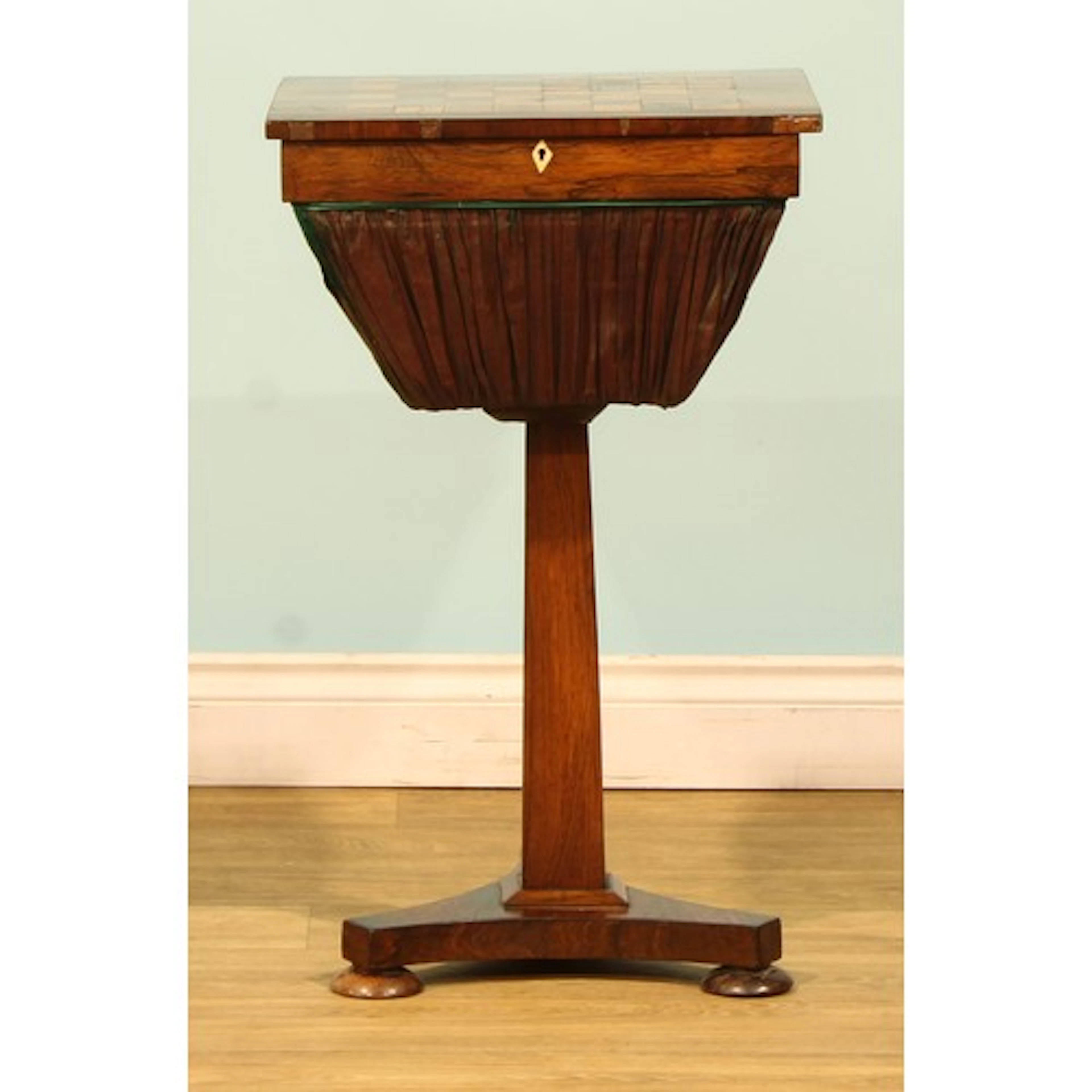A William IV rosewood and parquetry combination games and wo...