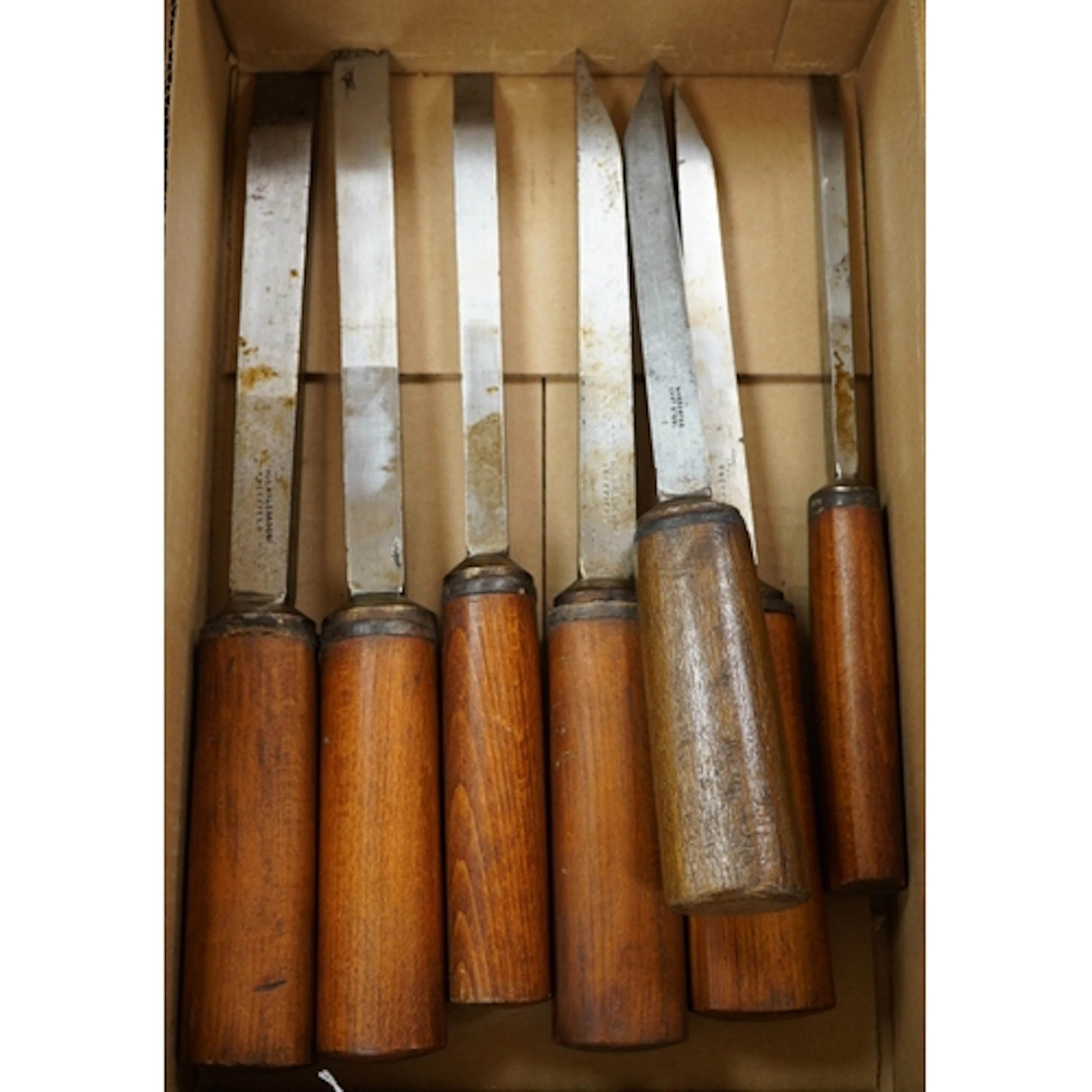 A set of seven Thomas Wales, Sheffield, heavy duty oak handl...