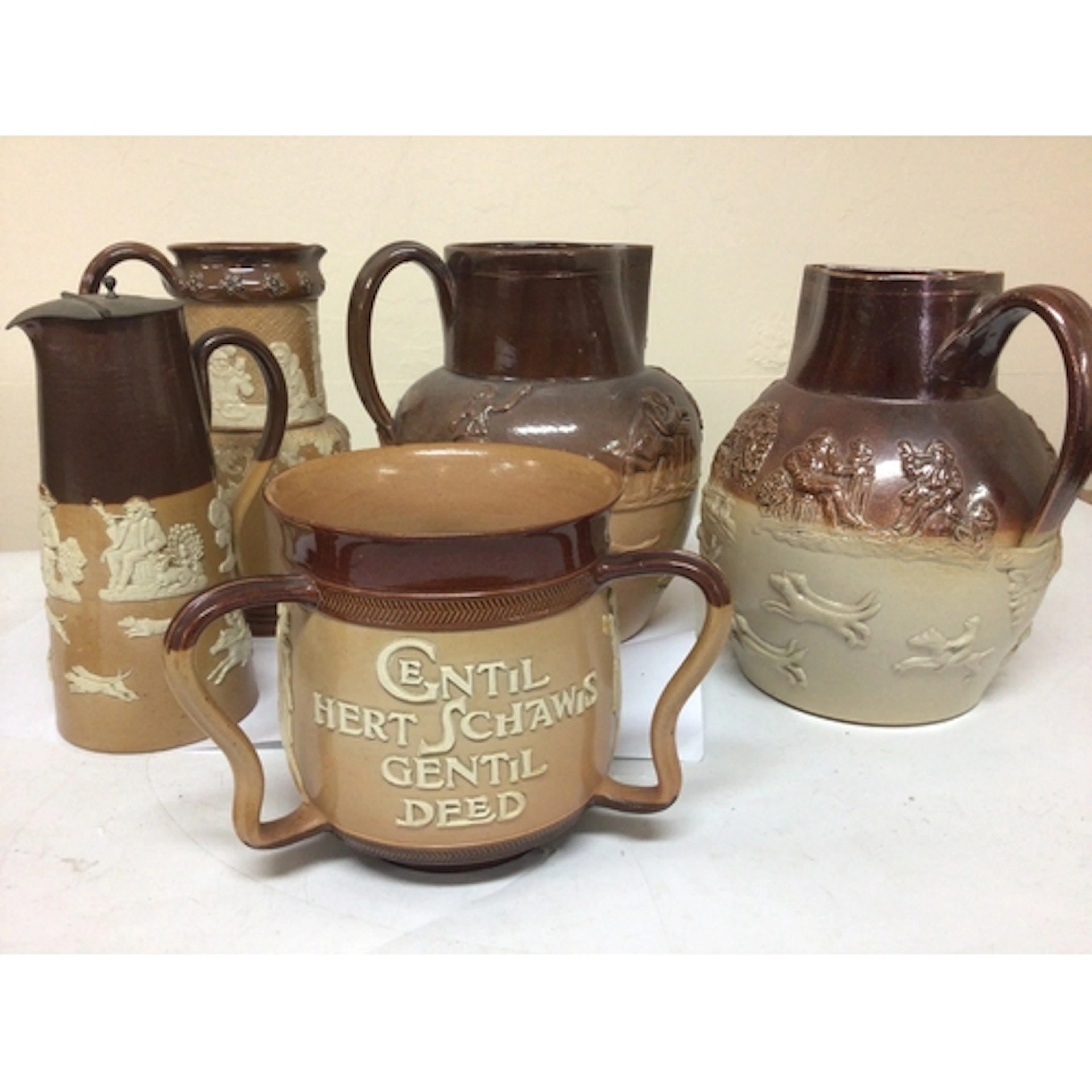 A Lambeth Doulton stoneware loving cup with the Nobel inscri...