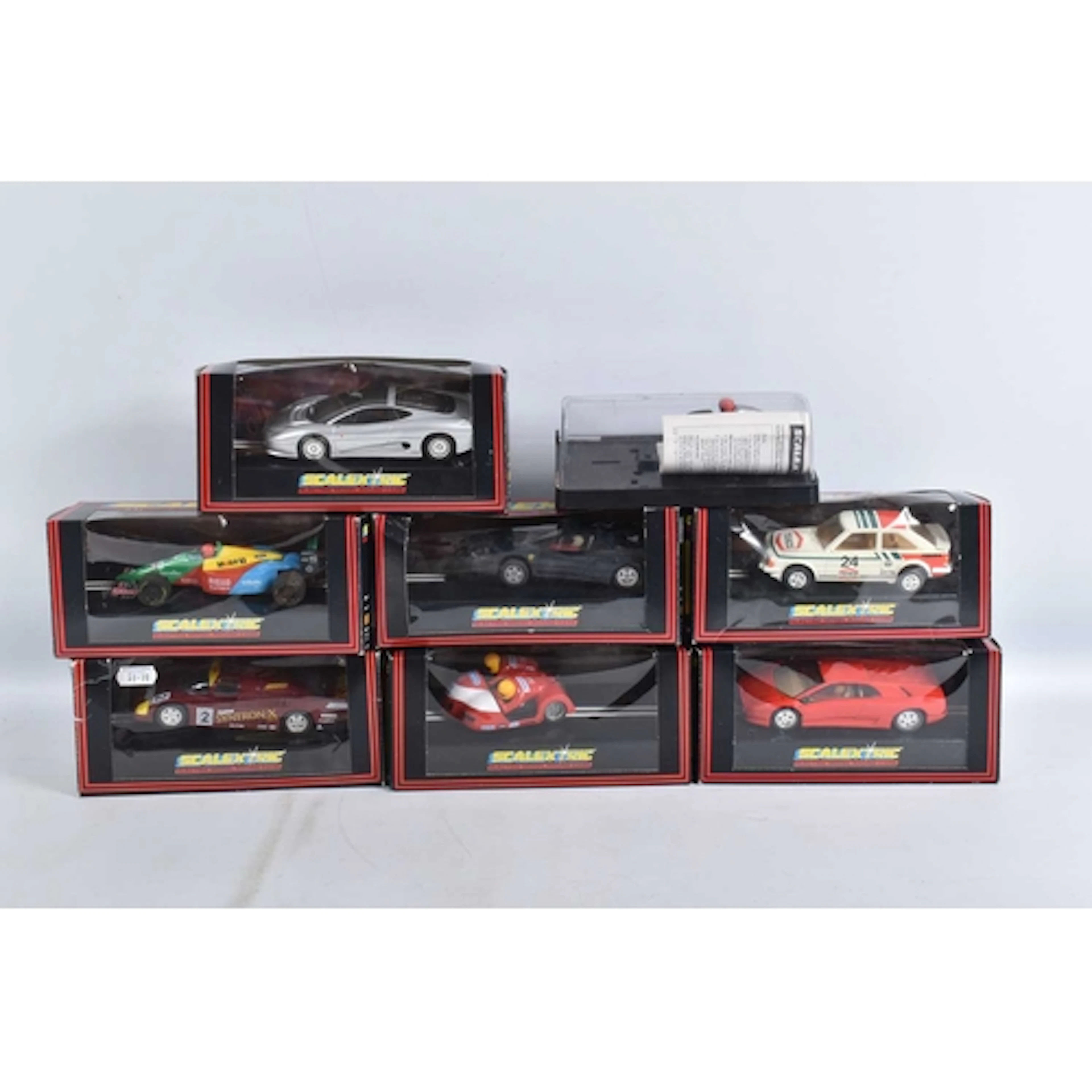 EIGHT BOXED SCALEXTRIC SLOT CARS, to include a Ferrari F40 C...