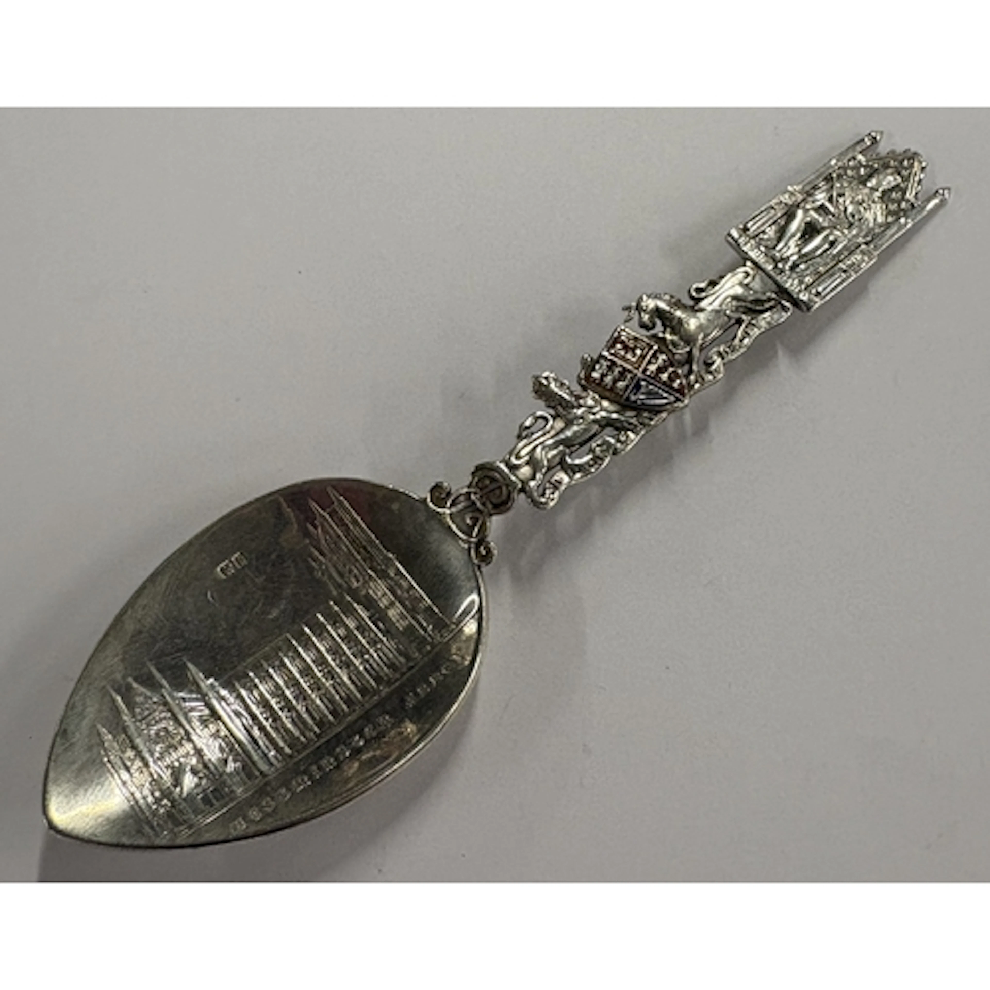 An Art Nouveau silver and enamelled souvenir spoon from 'Wes...