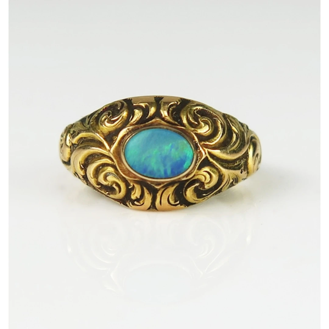 A 19th century opal ring in a high carat precious yellow met...
