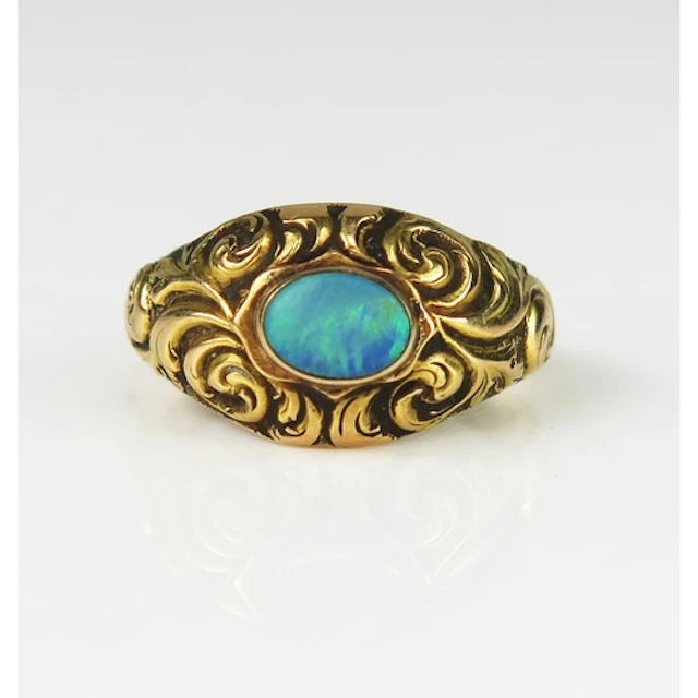 A 19th century opal ring in a high carat precious yellow met...