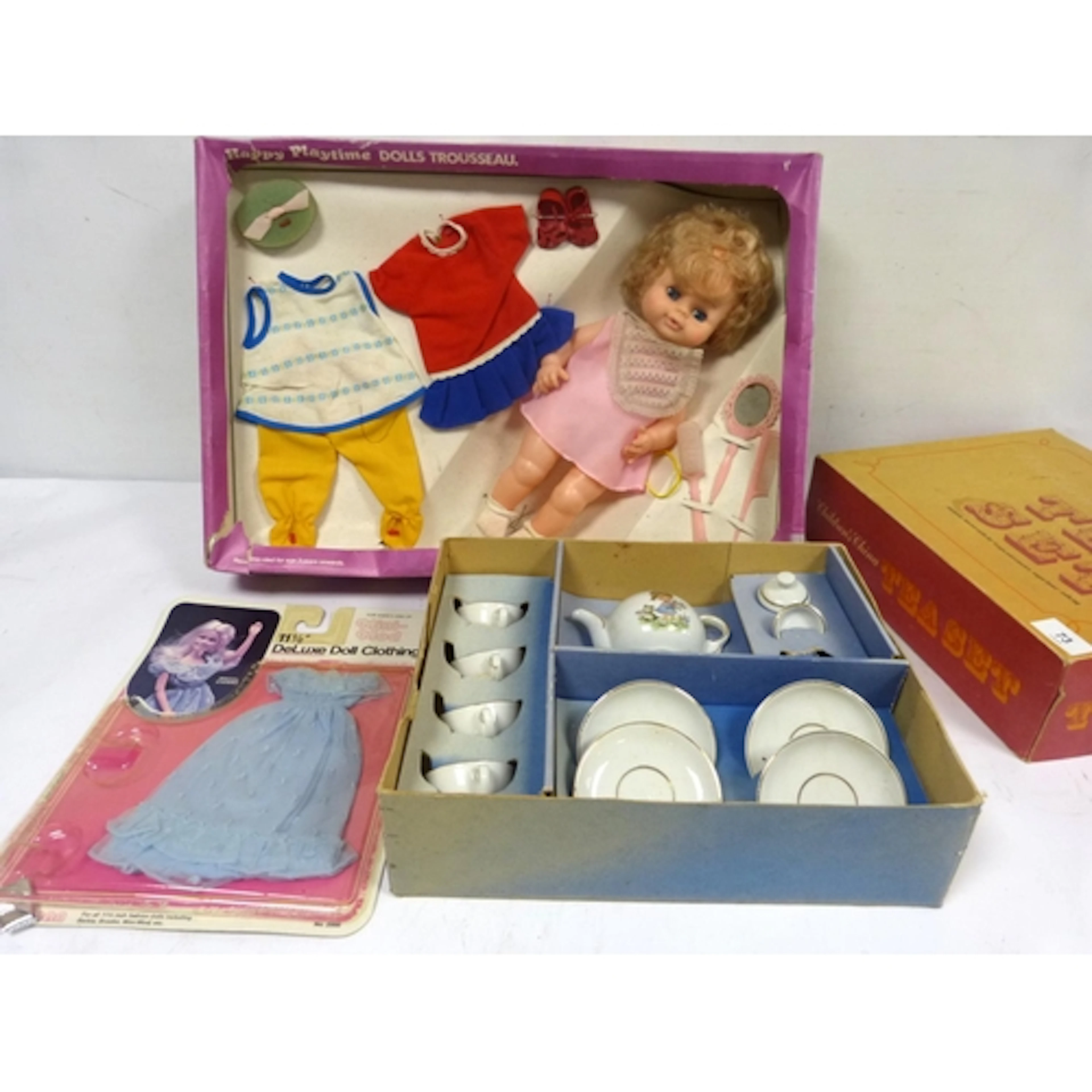 Happy play time doll set and child's china tea set.