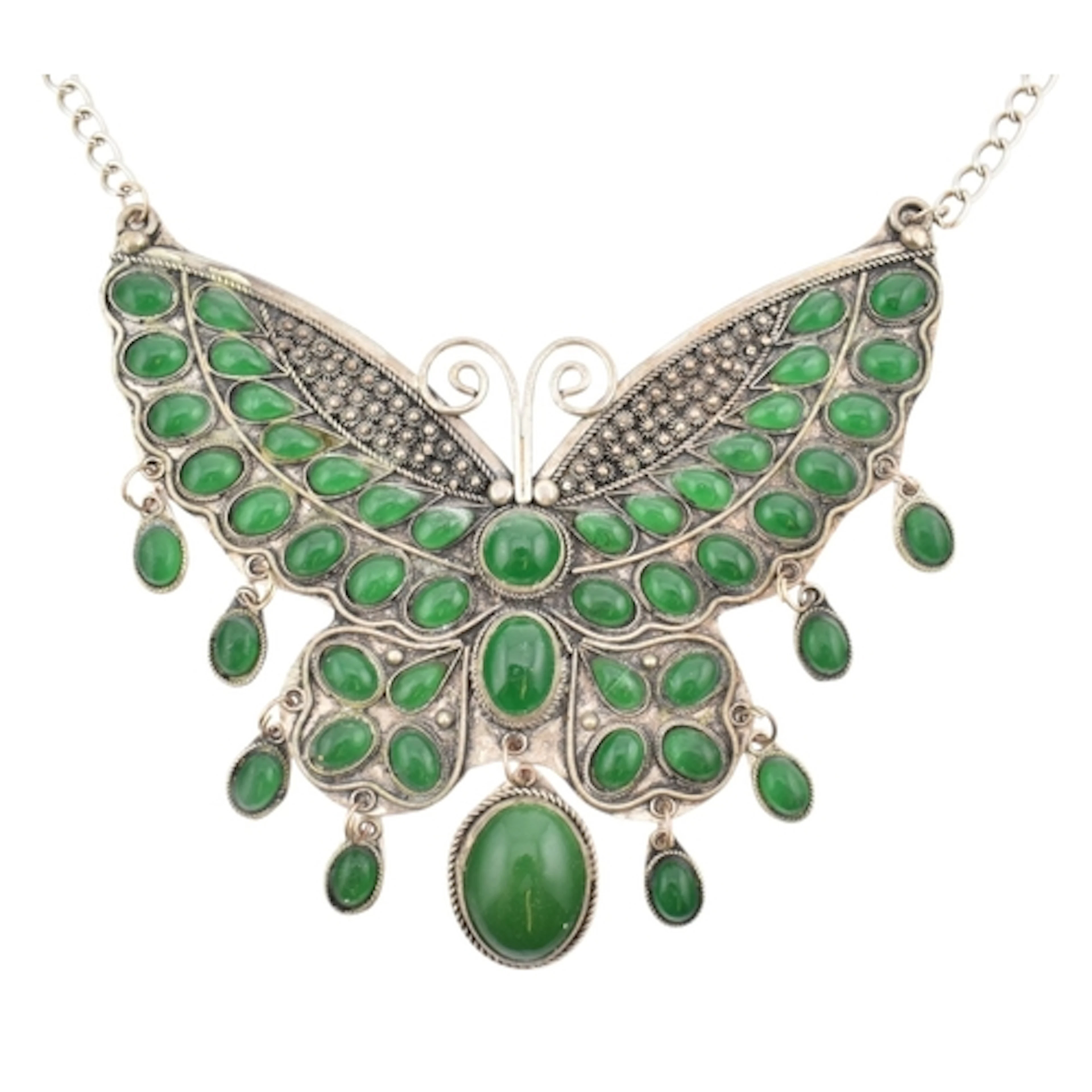 A large silver tone and green stone butterfly statement neck...