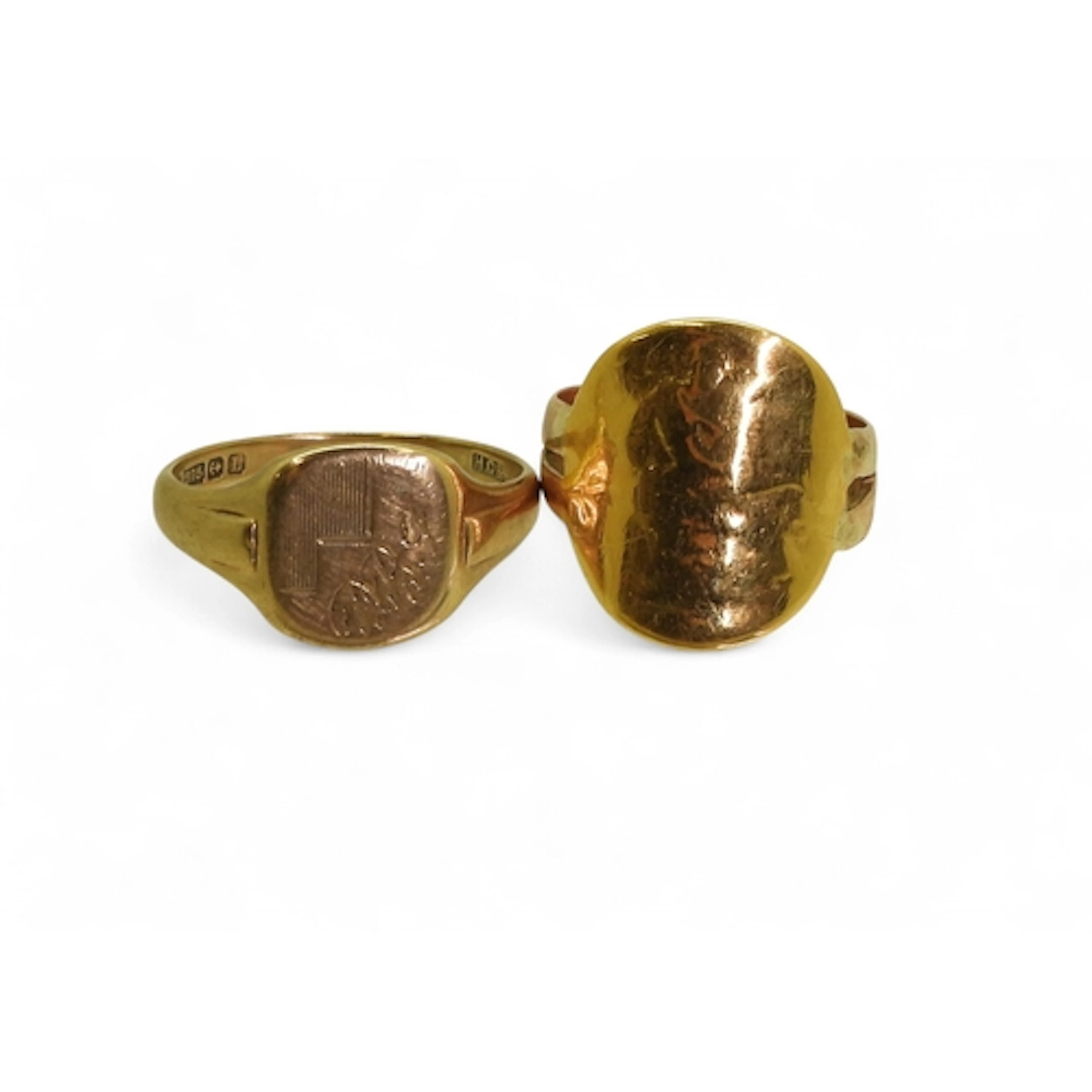 A half sovereign ring with a soldered on 9ct rose gold weddi...
