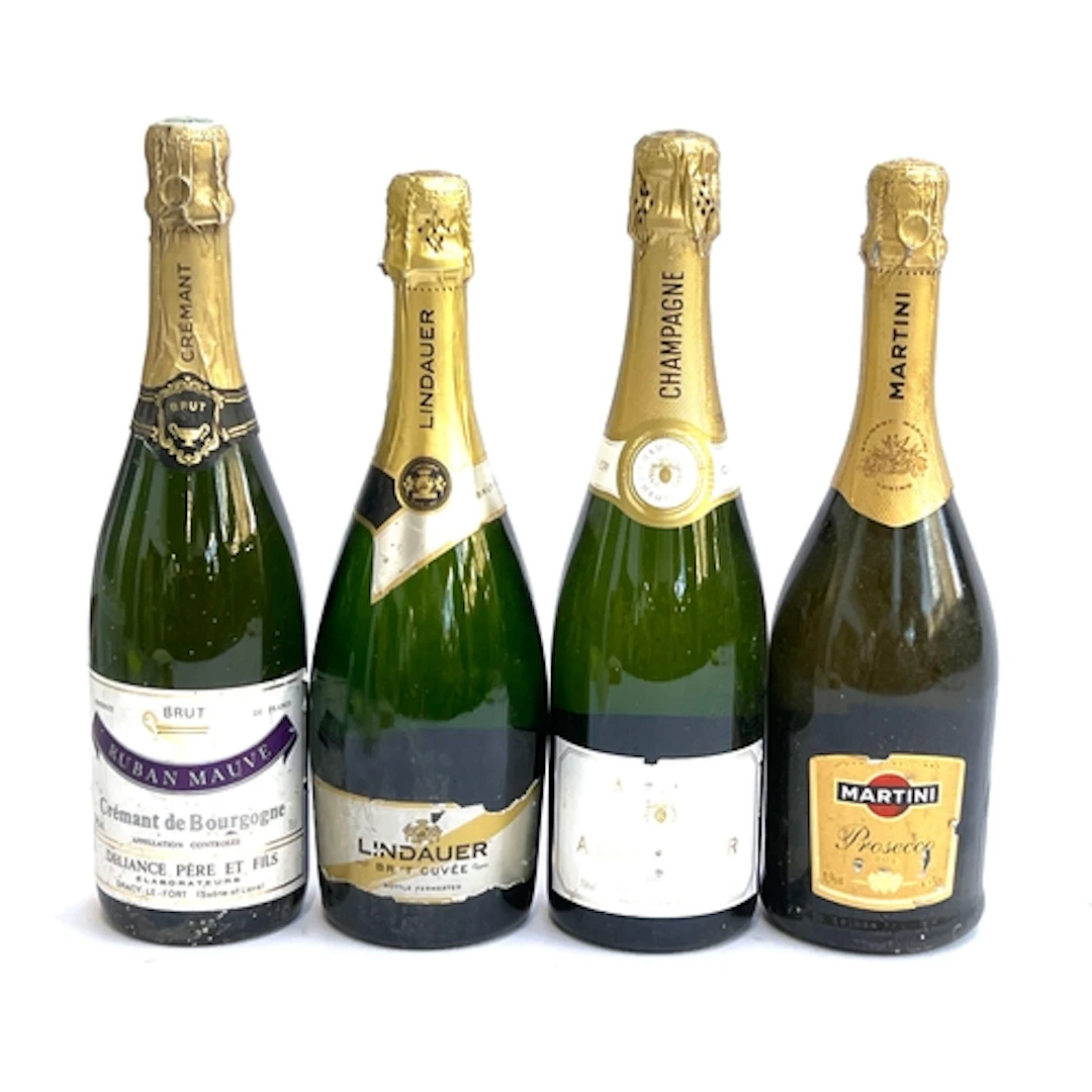 Four bottles of fizz to include Champagne A Carpentier Brut;...