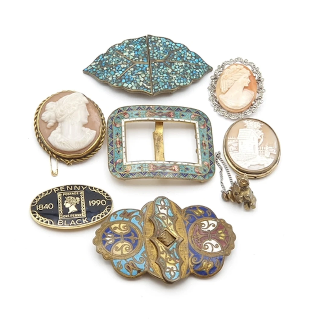 An Arts & Crafts Enamel Belt Buckle, a further Enamel Belt B...