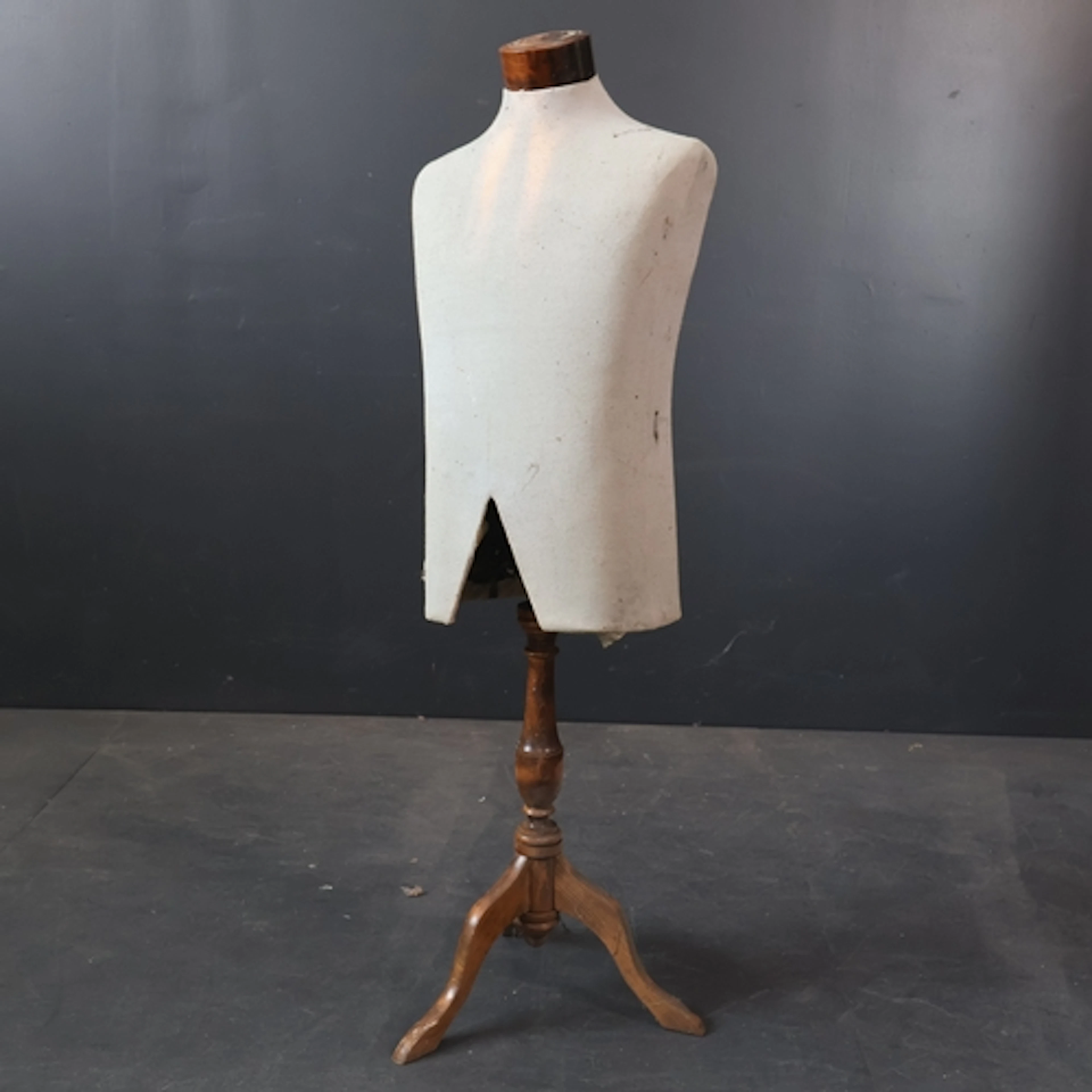 A vintage shop display mannequin on turned oak telescopic st...