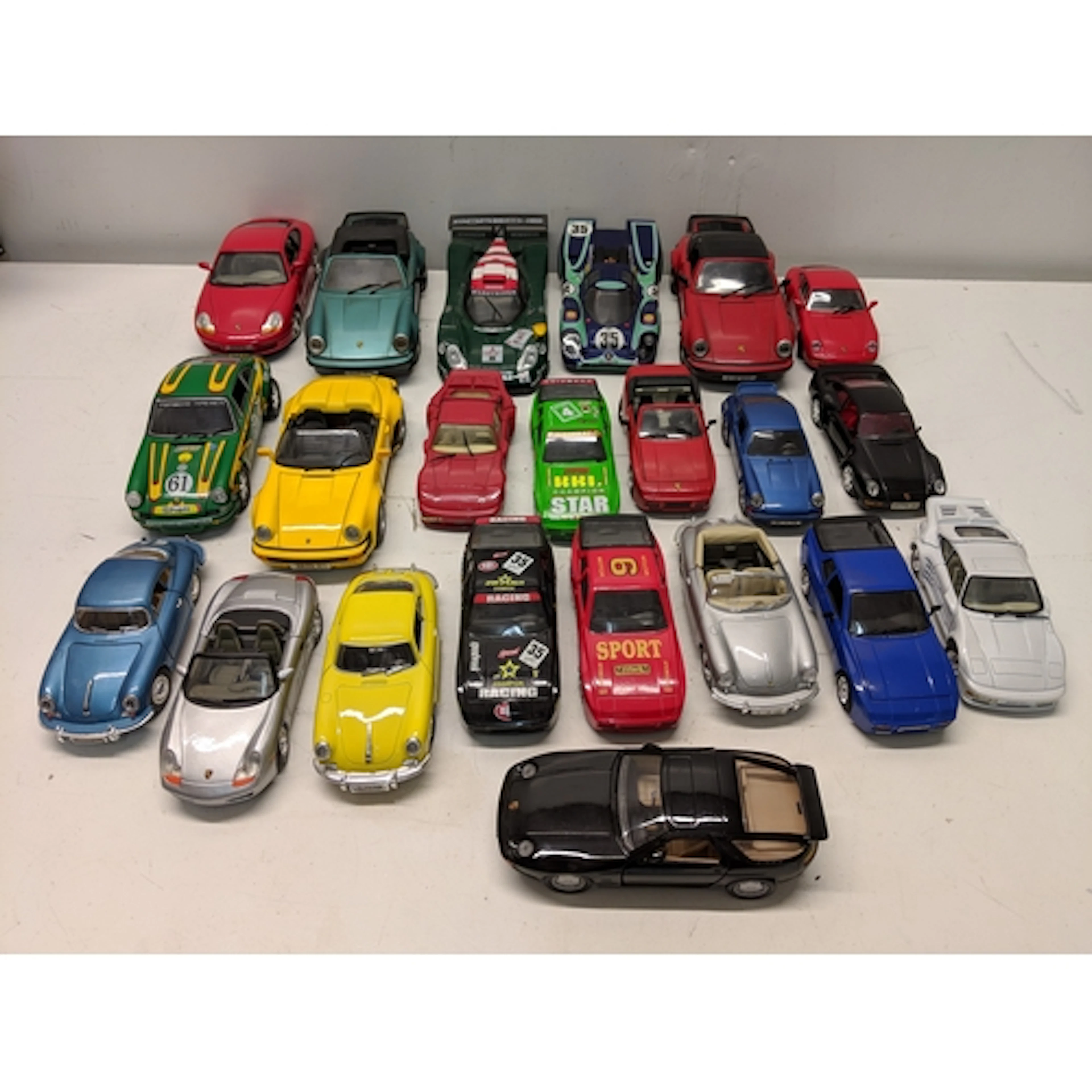 Twenty two models of Porsche cars to include some 1/18 scale...