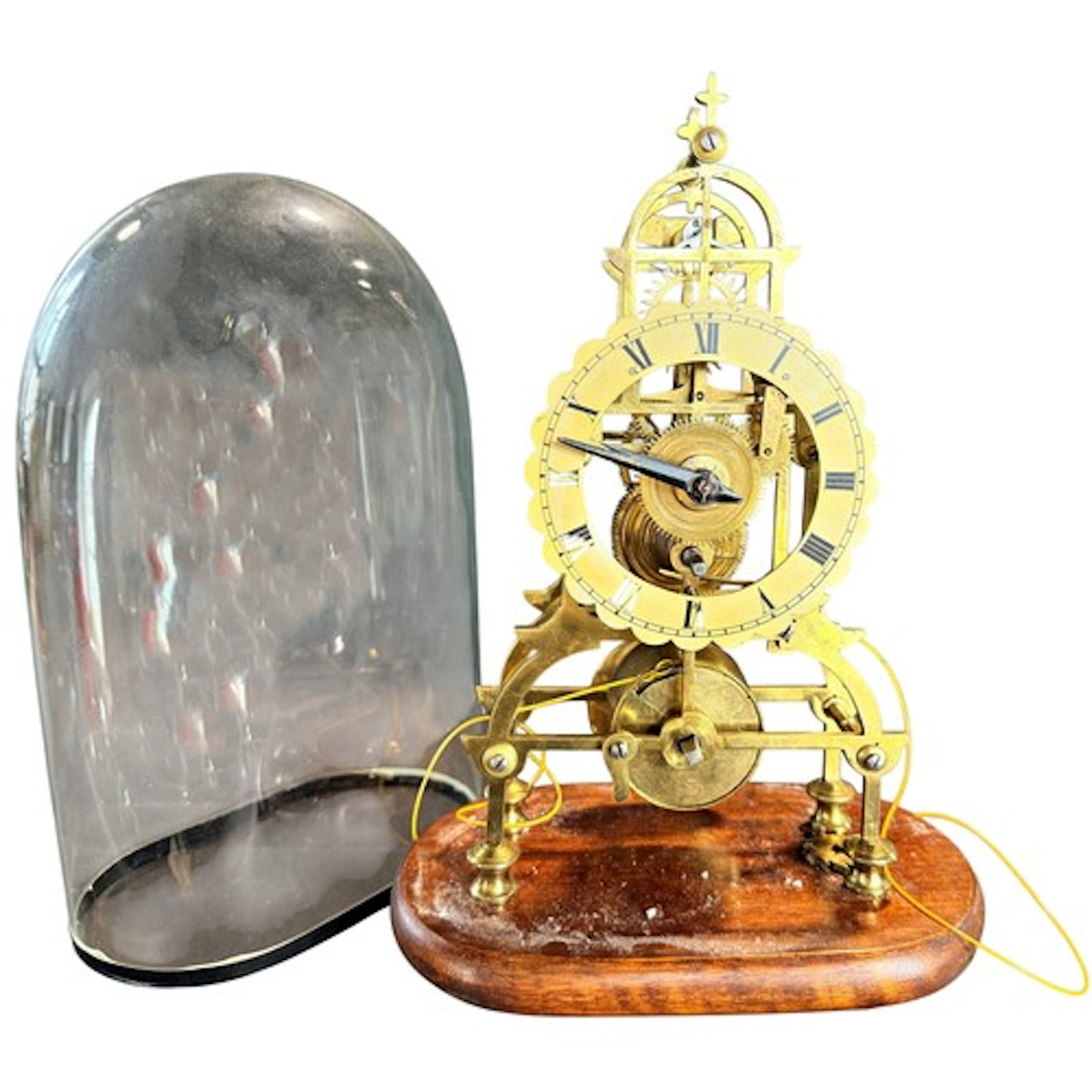 A late 19th/early 20th century brass skeleton clock under gl...