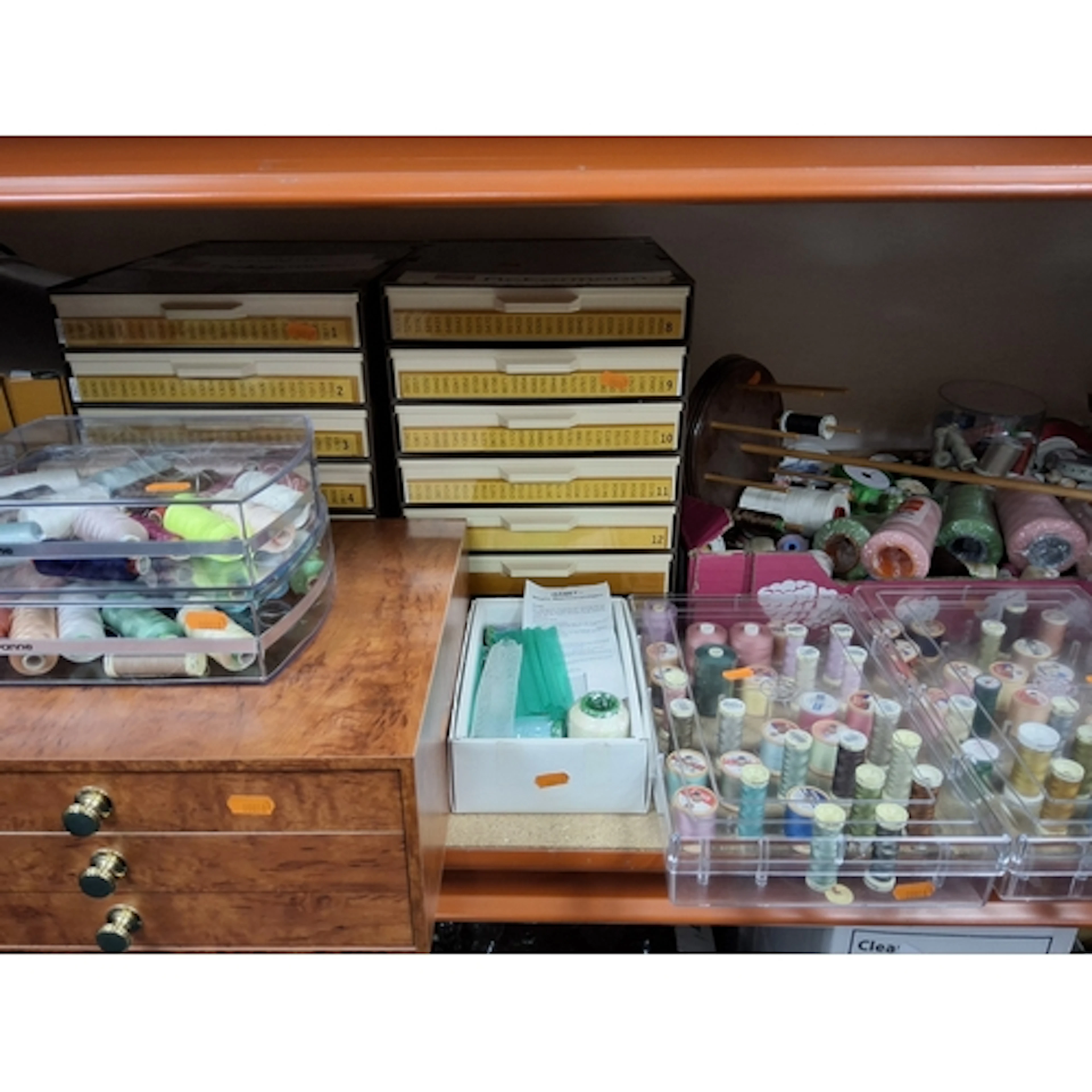 A LARGE QUANTITY OF ASSORTED THREADS to include a tray of as...