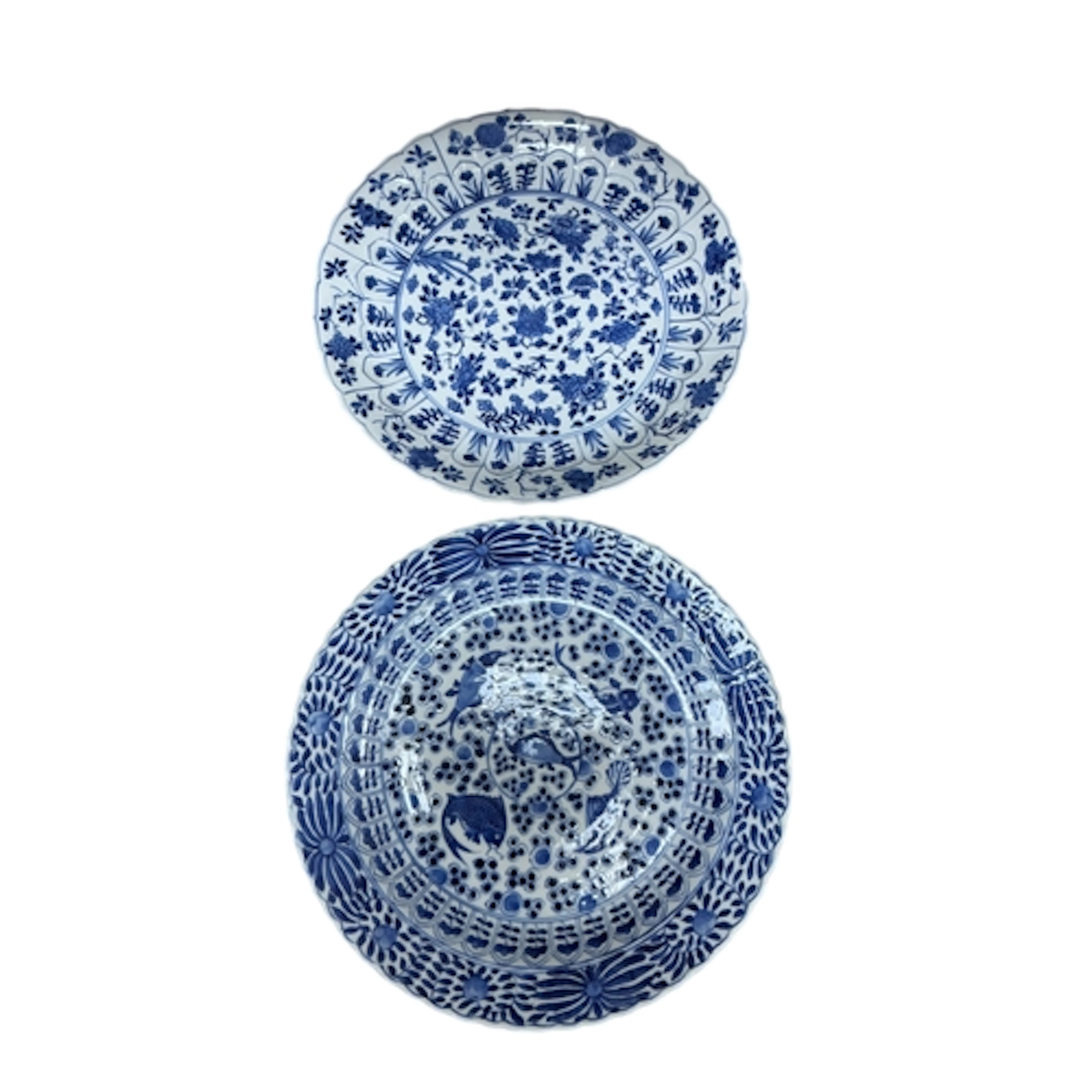 A Chinese blue and white dish, Kangxi period, and a Kangxi s...
