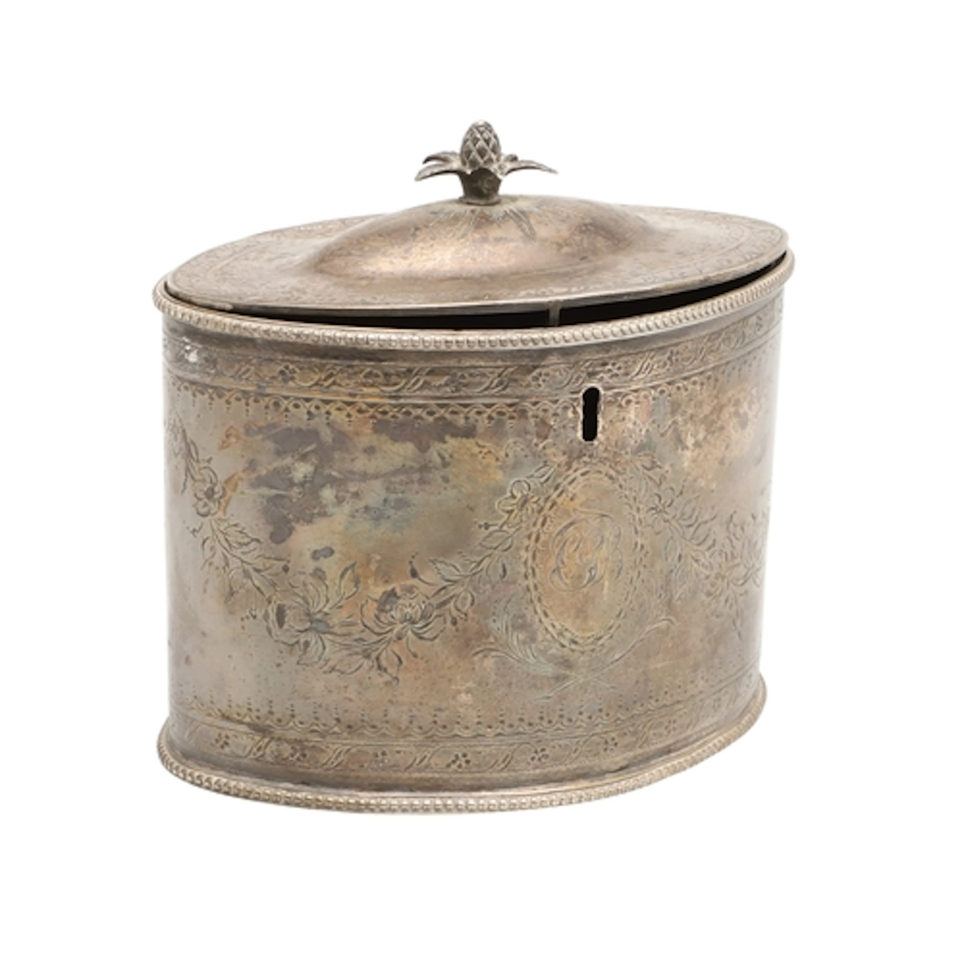 A GEORGE III TEA CADDY. oval with domed cover and pineapple ...