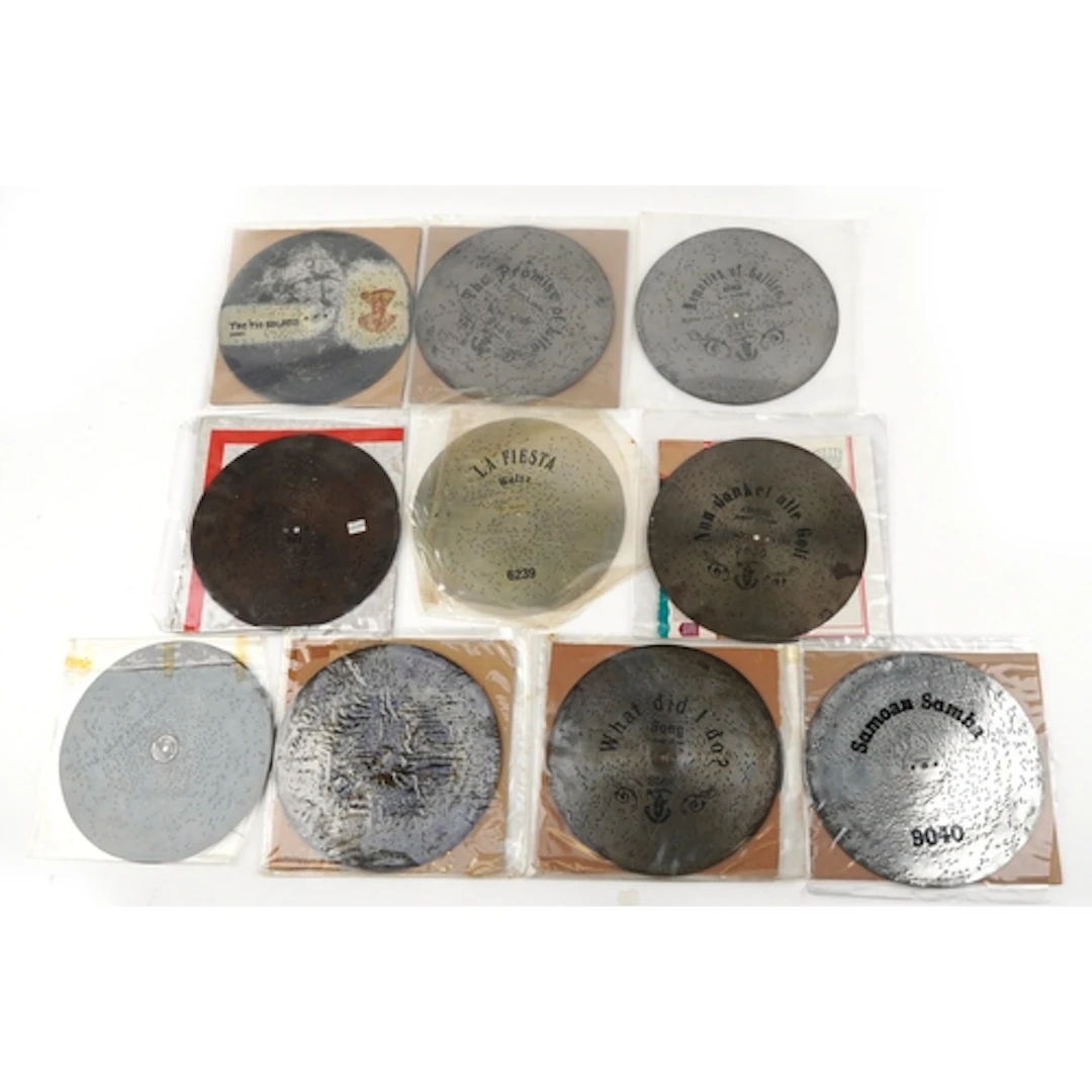 Twelve eleven inch Polyphon discs including The Tin Soldiers...