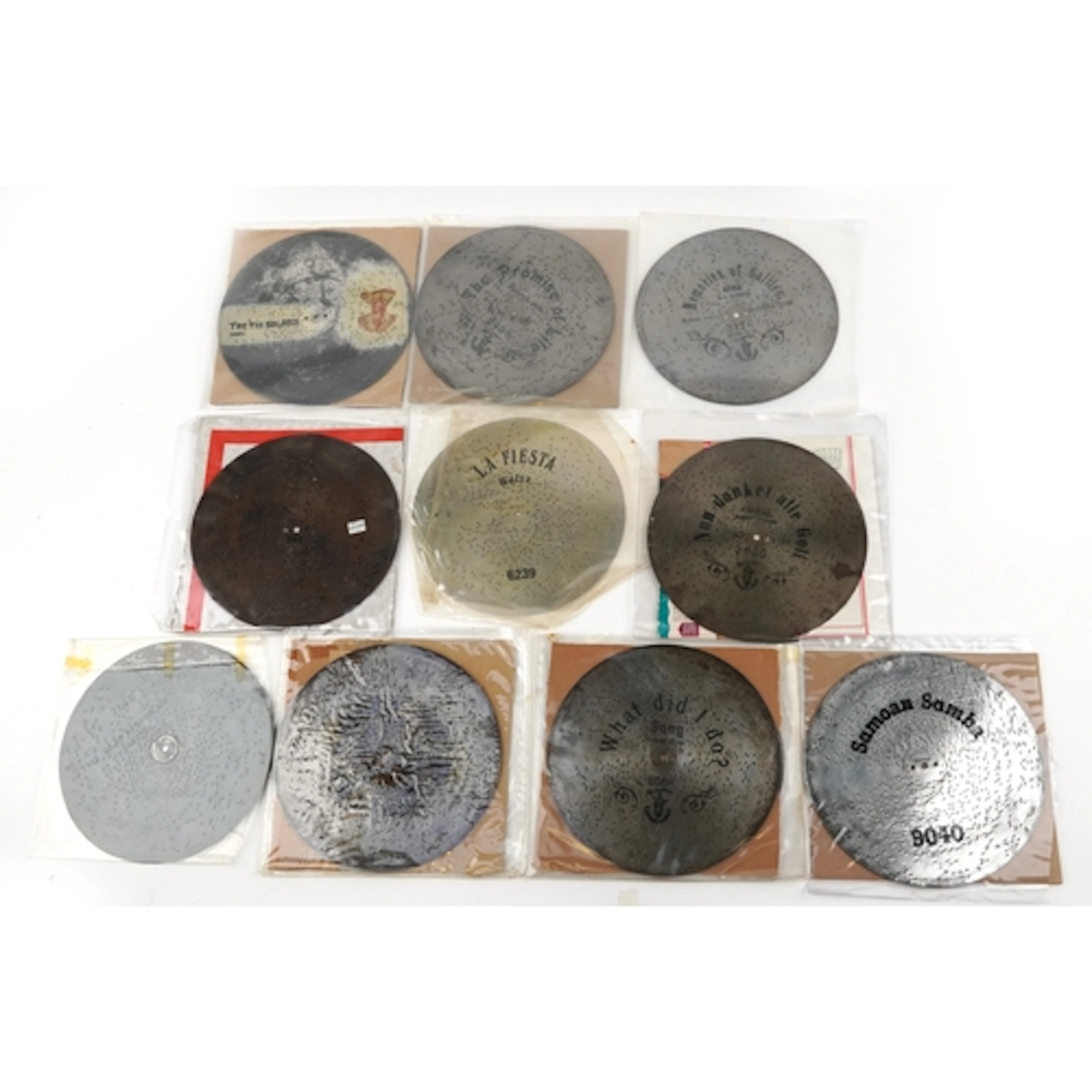 Twelve eleven inch Polyphon discs including The Tin Soldiers...