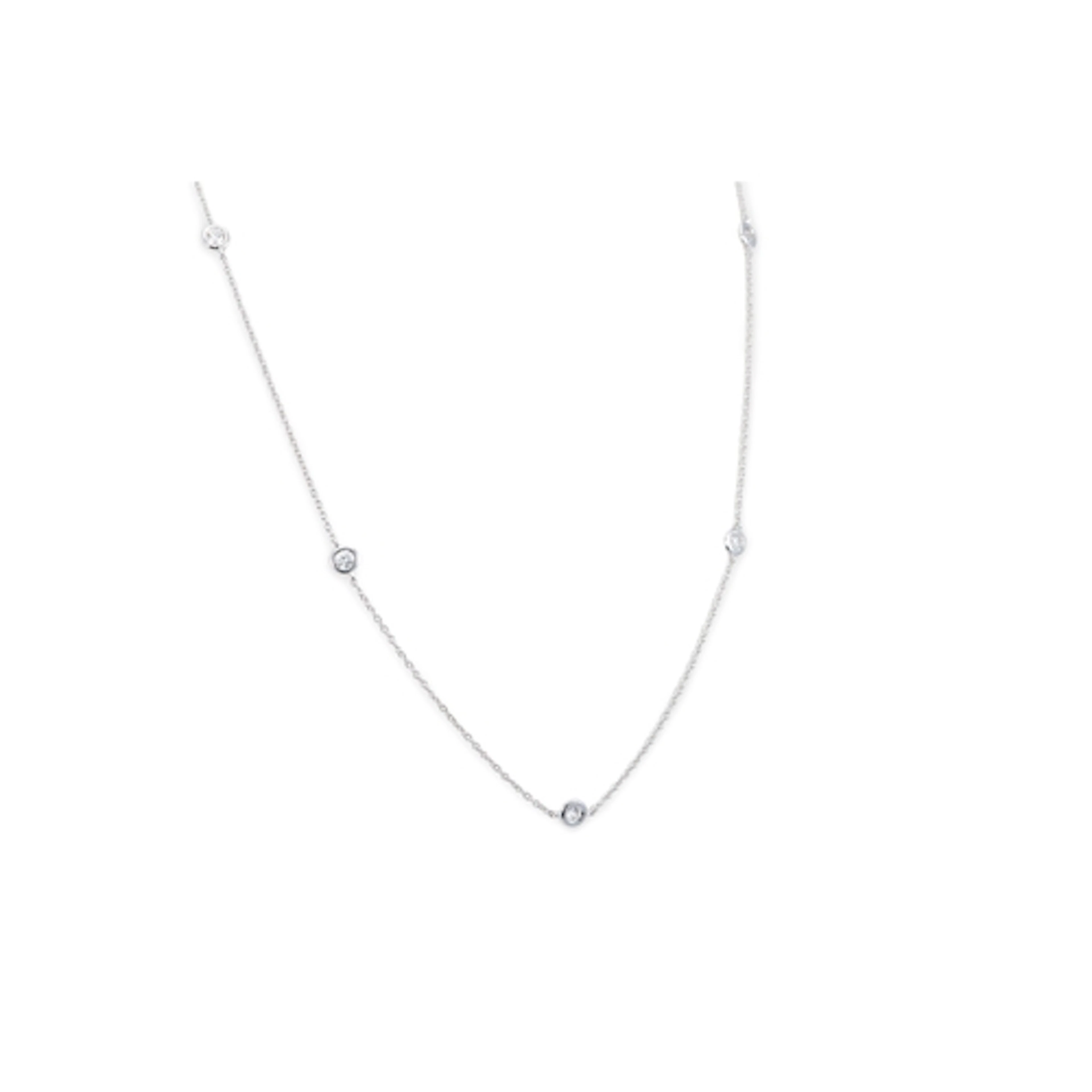 A DIAMOND SET CHAIN NECKLACE, the bezel round cut diamond in...
