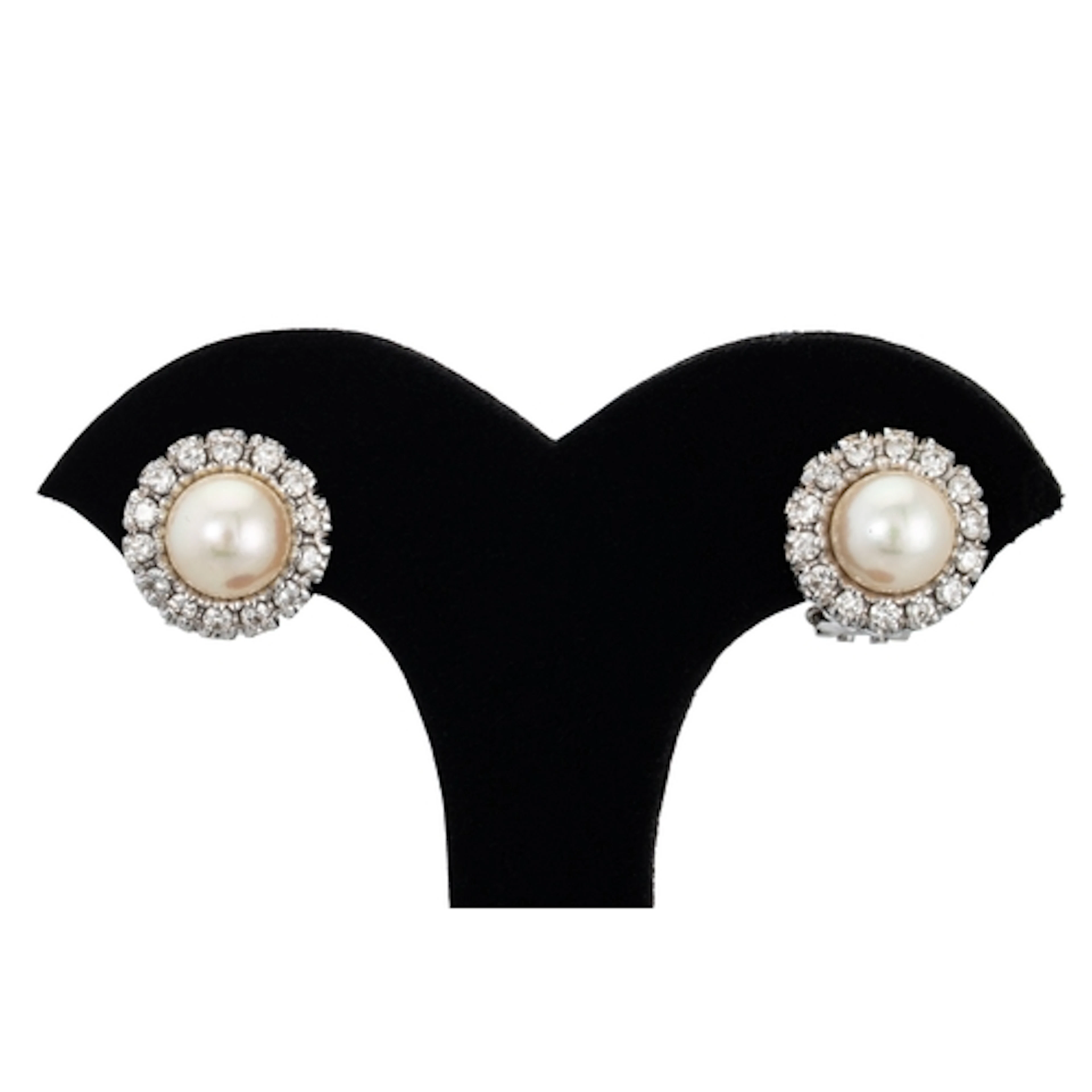 A PAIR OF CULTURED PEARL AND DIAMOND CLUSTER EARRINGS, mount...