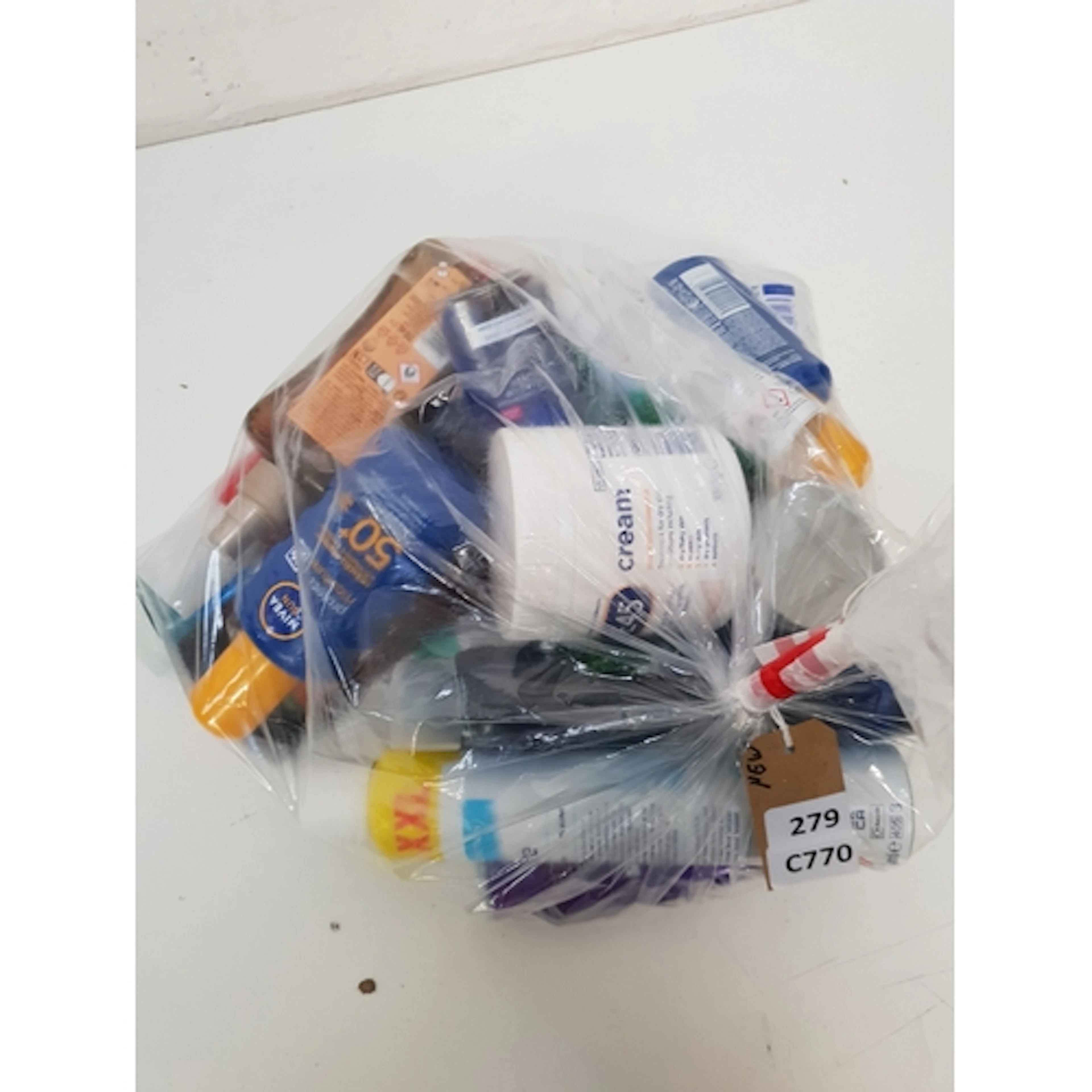 ONE BAG OF NEW AND USED COSMETICS Including Hawaiian, Sure,...