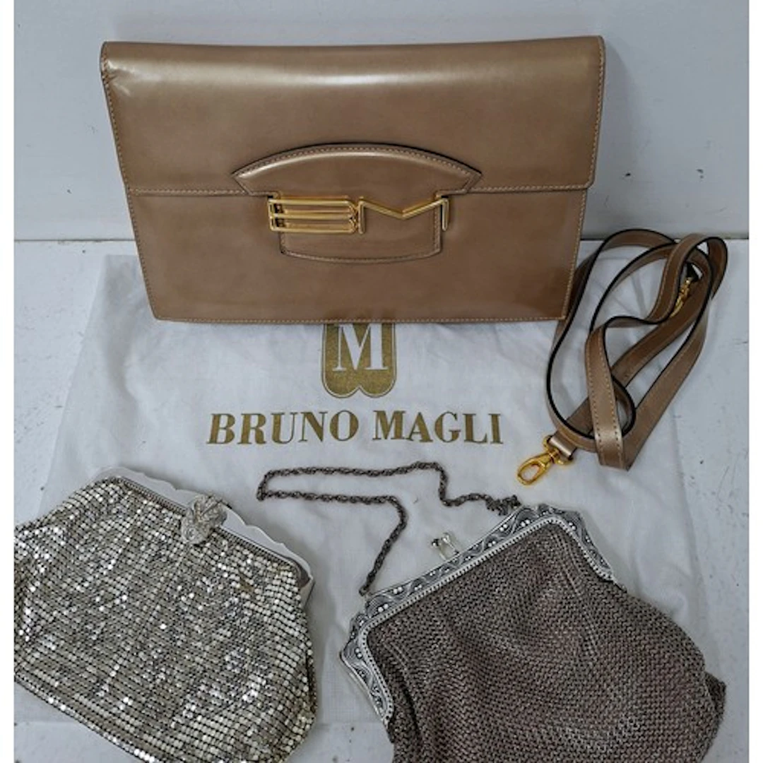 A vintage Bruno Magli gold coloured shoulder bag having gold...