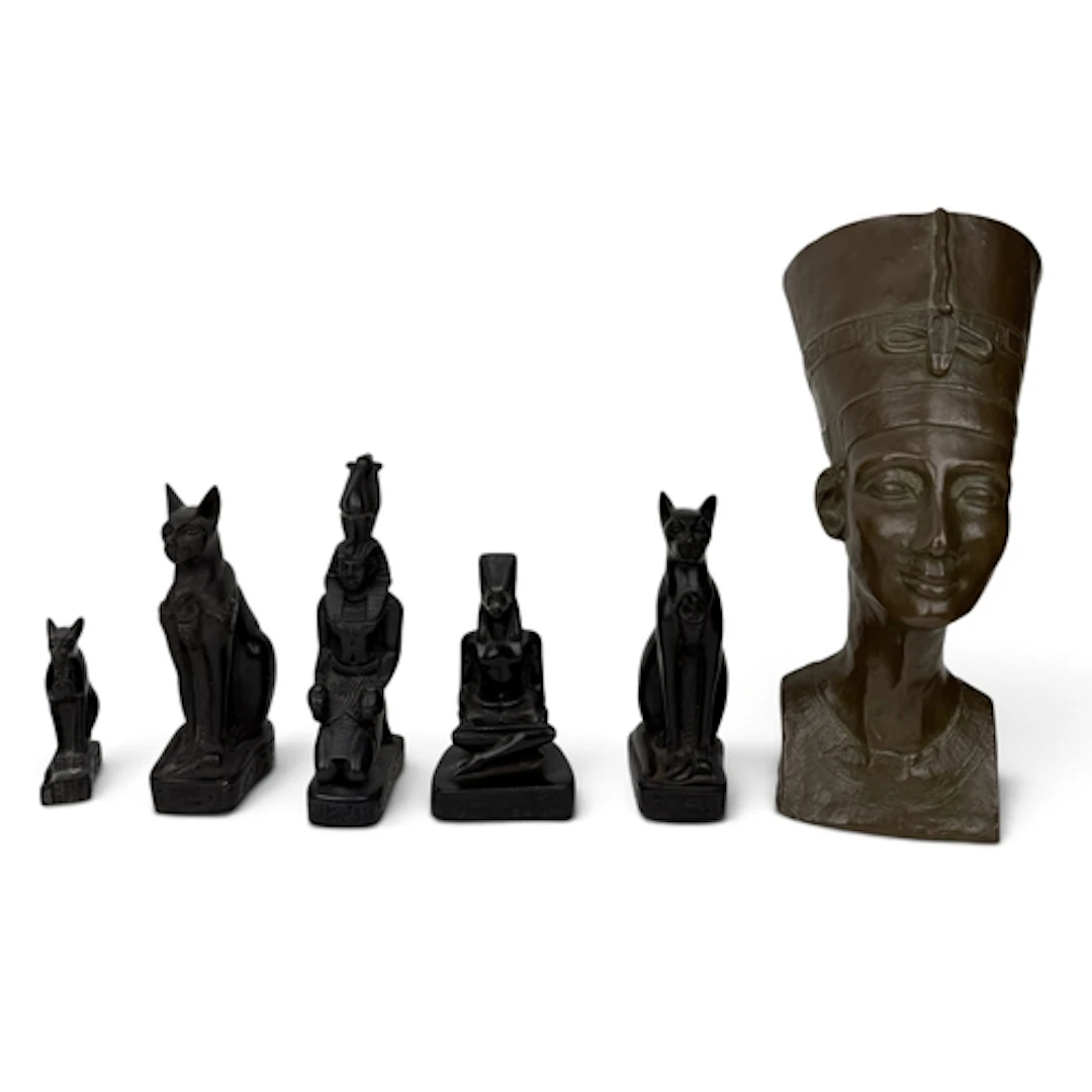 A RESIN BRONZE BUST OF QUEEN NEFERTITI Together with other c...
