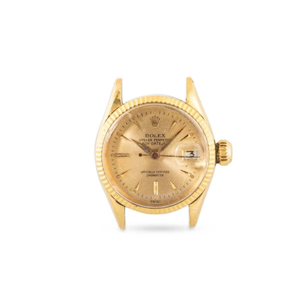 A LADY'S ROLEX DATEJUST GOLD WATCH HEAD, no strap, gold face...