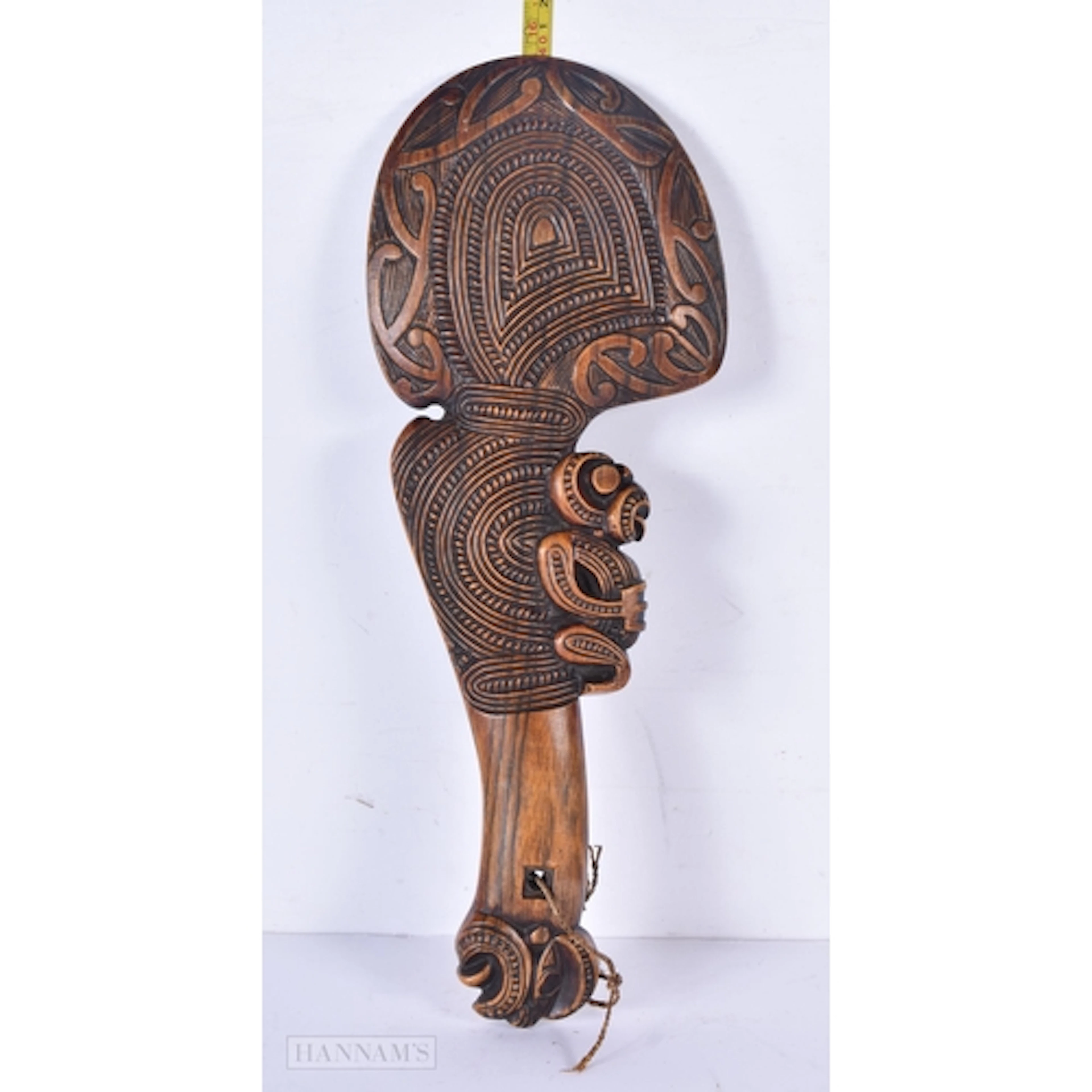 A 20th Century carved wooden Maori Wahaika club 41 x 15.5 cm