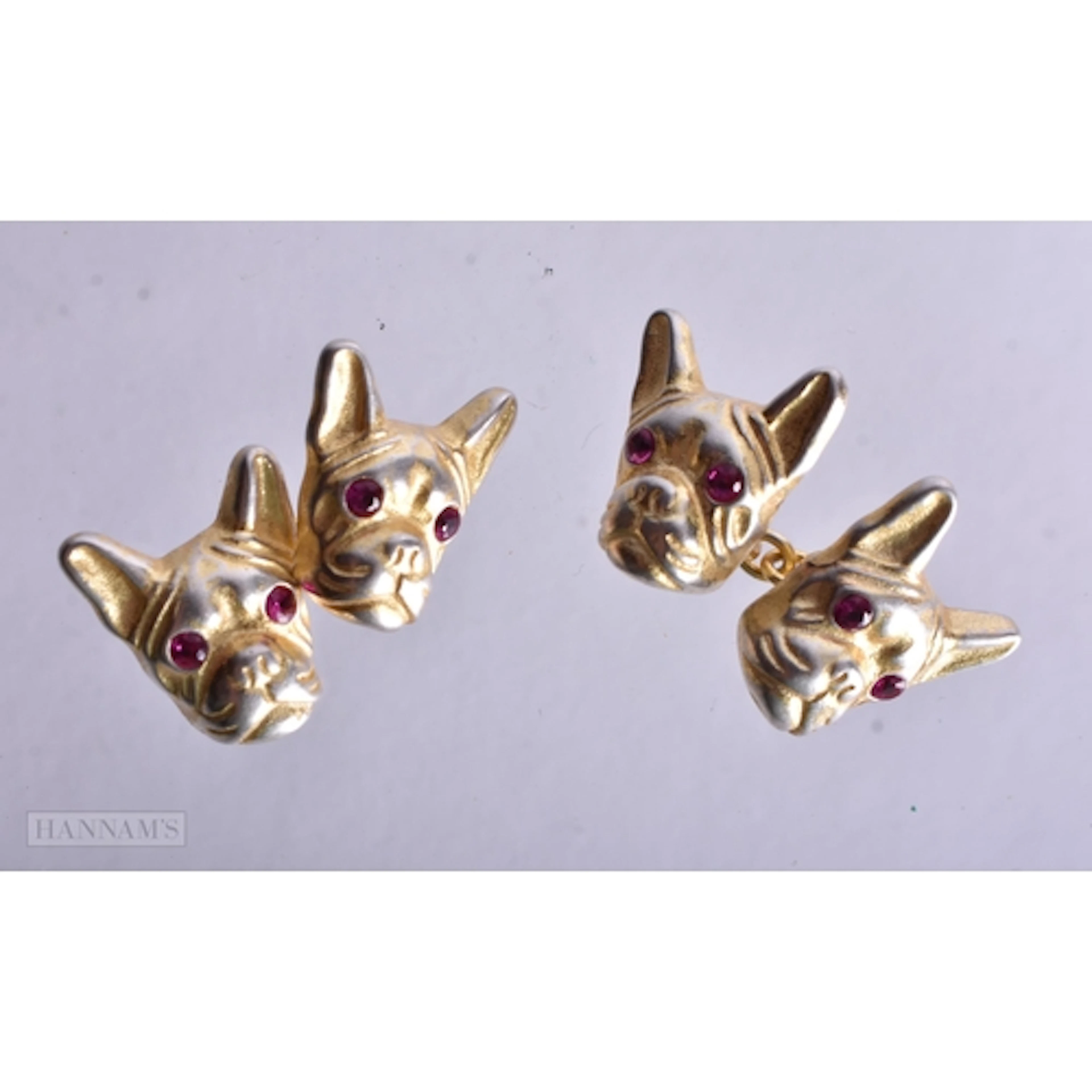 A Pair of Continental Silver Gilt Dogs Head Cufflinks. Stam...