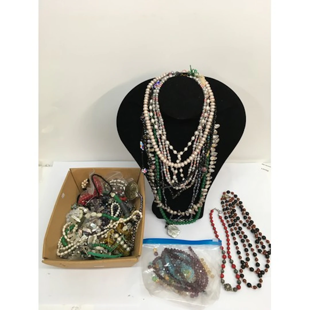 A collection of cultured pearls and hardstone bead necklaces...