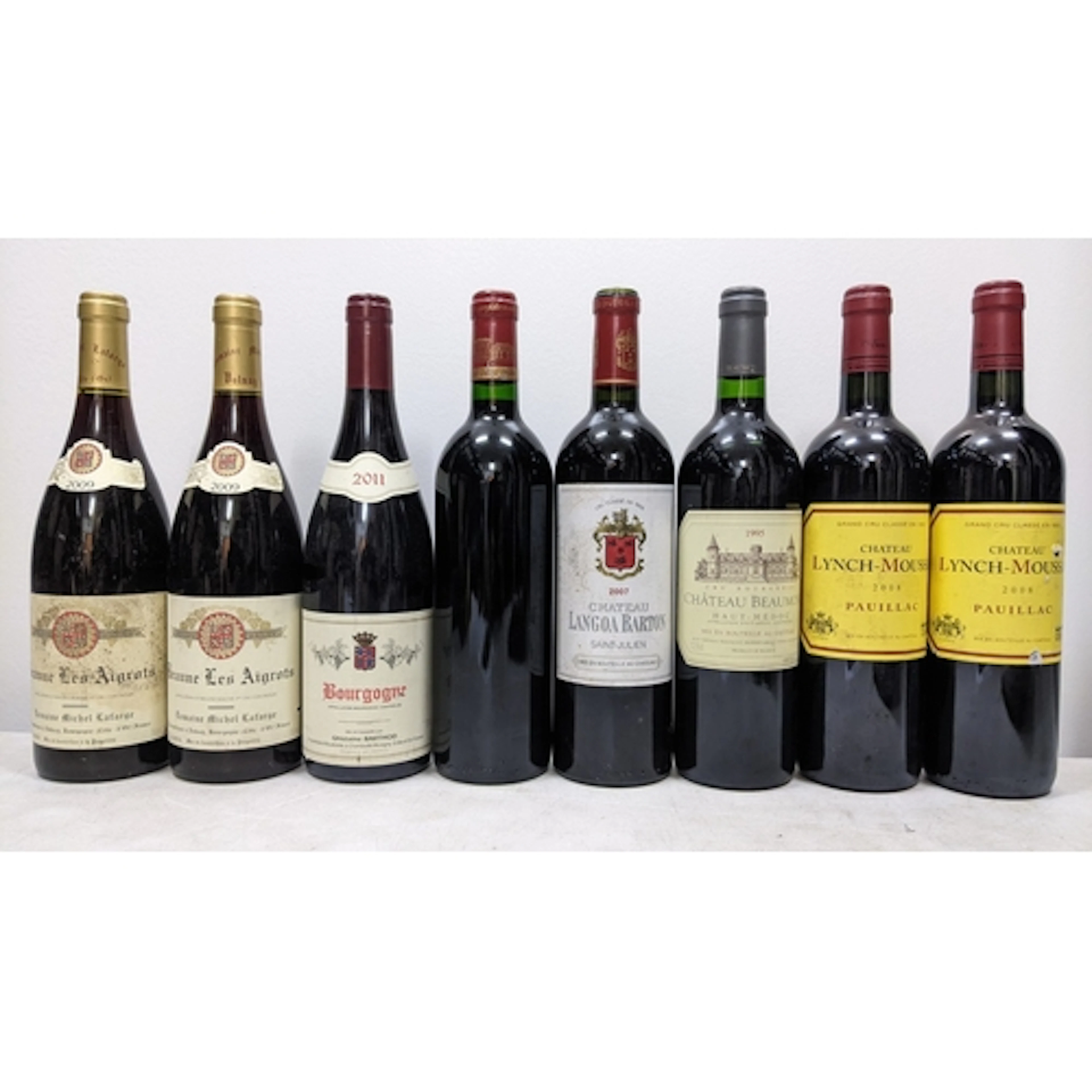 Eight bottles of assorted French red wine, comprising:- - Tw...