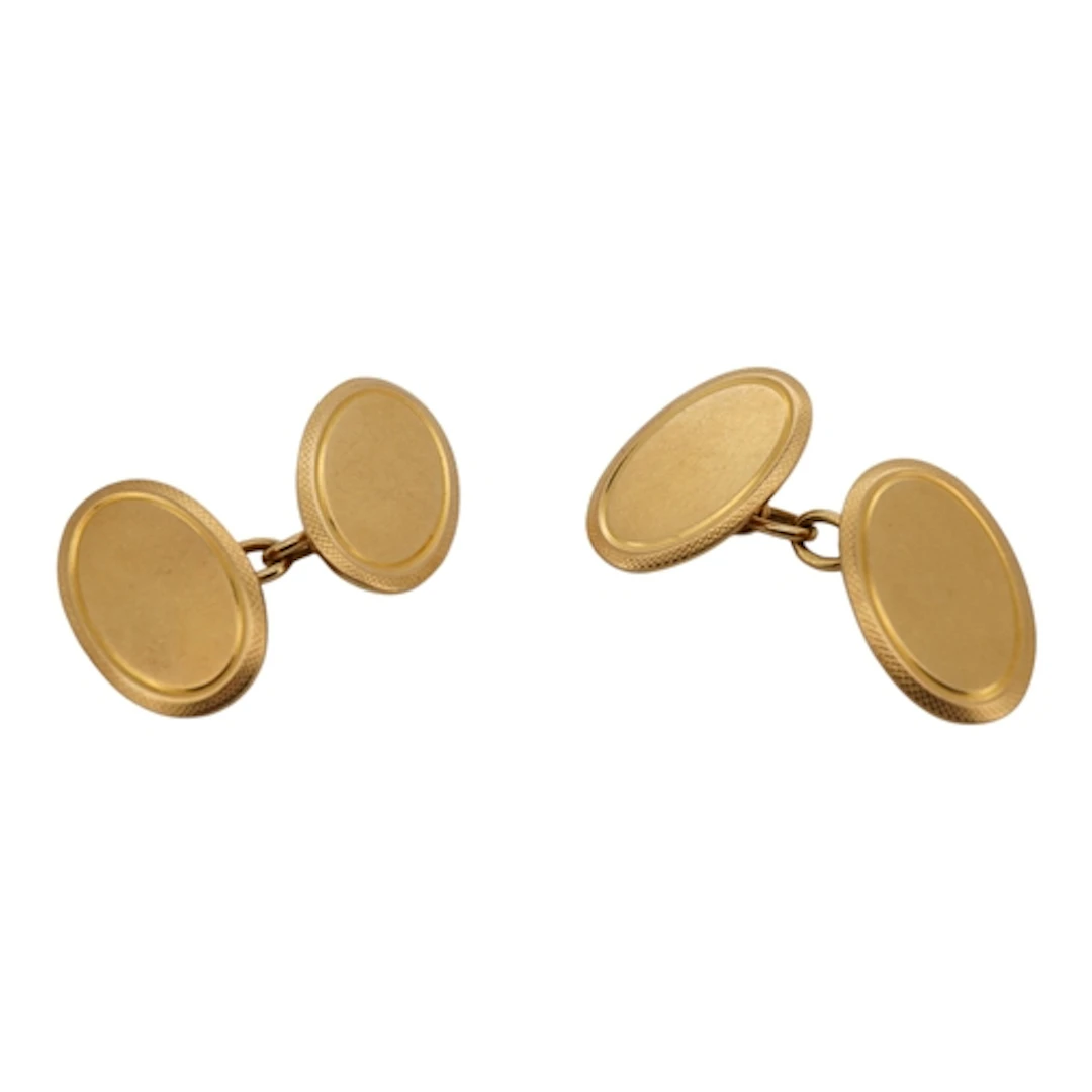 A pair of 1980's 18ct gold oval cufflinks, approx. 17mm, 13....