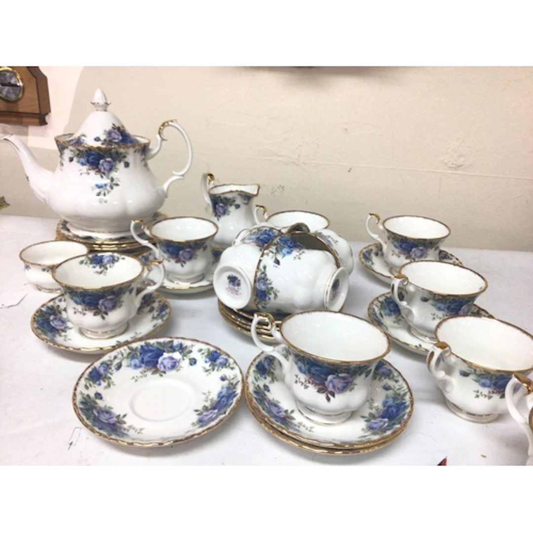 A Royal Albert Moonlight Rose tea set with tea pot twe...