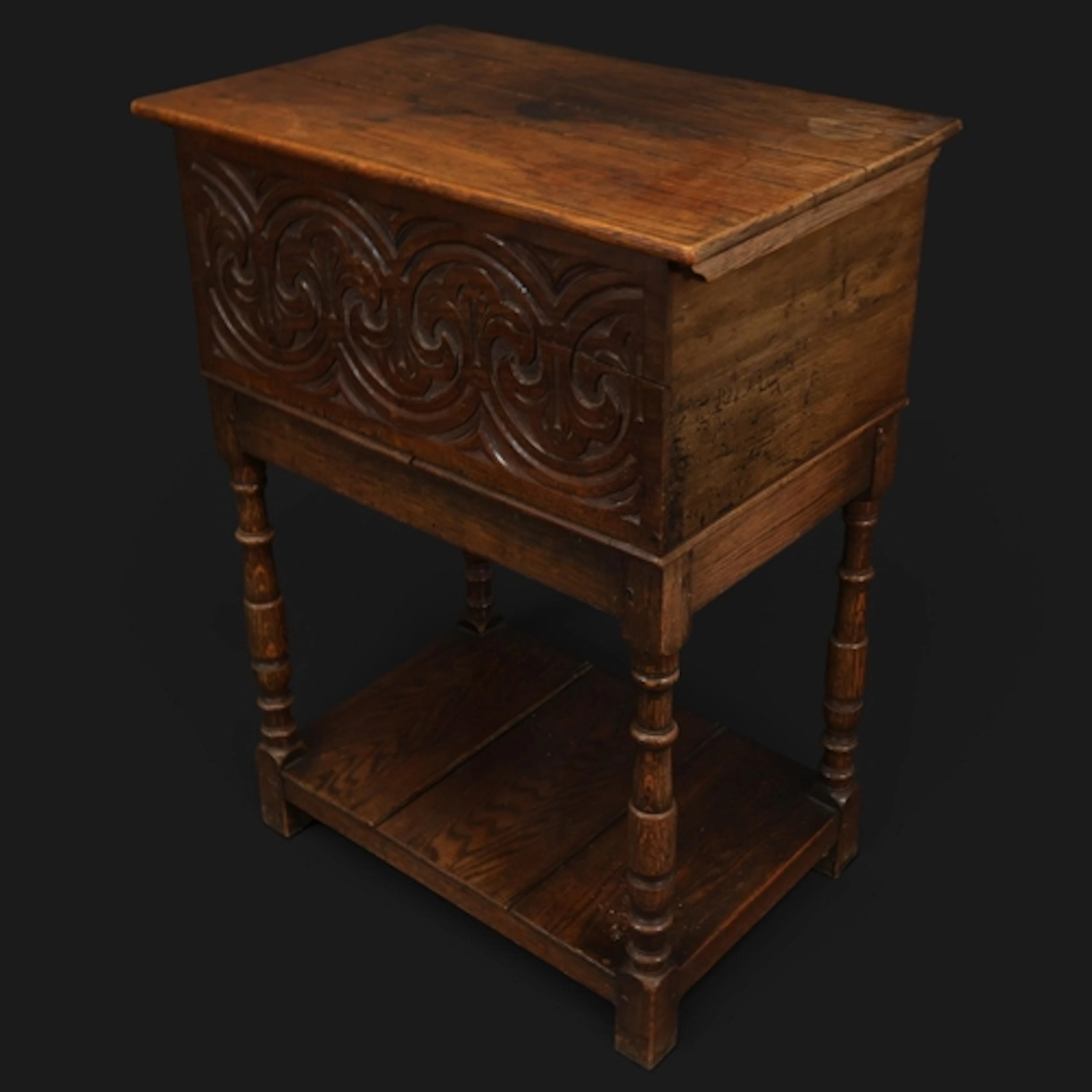 An antique oak bible box / chest on stand, with carved decor...