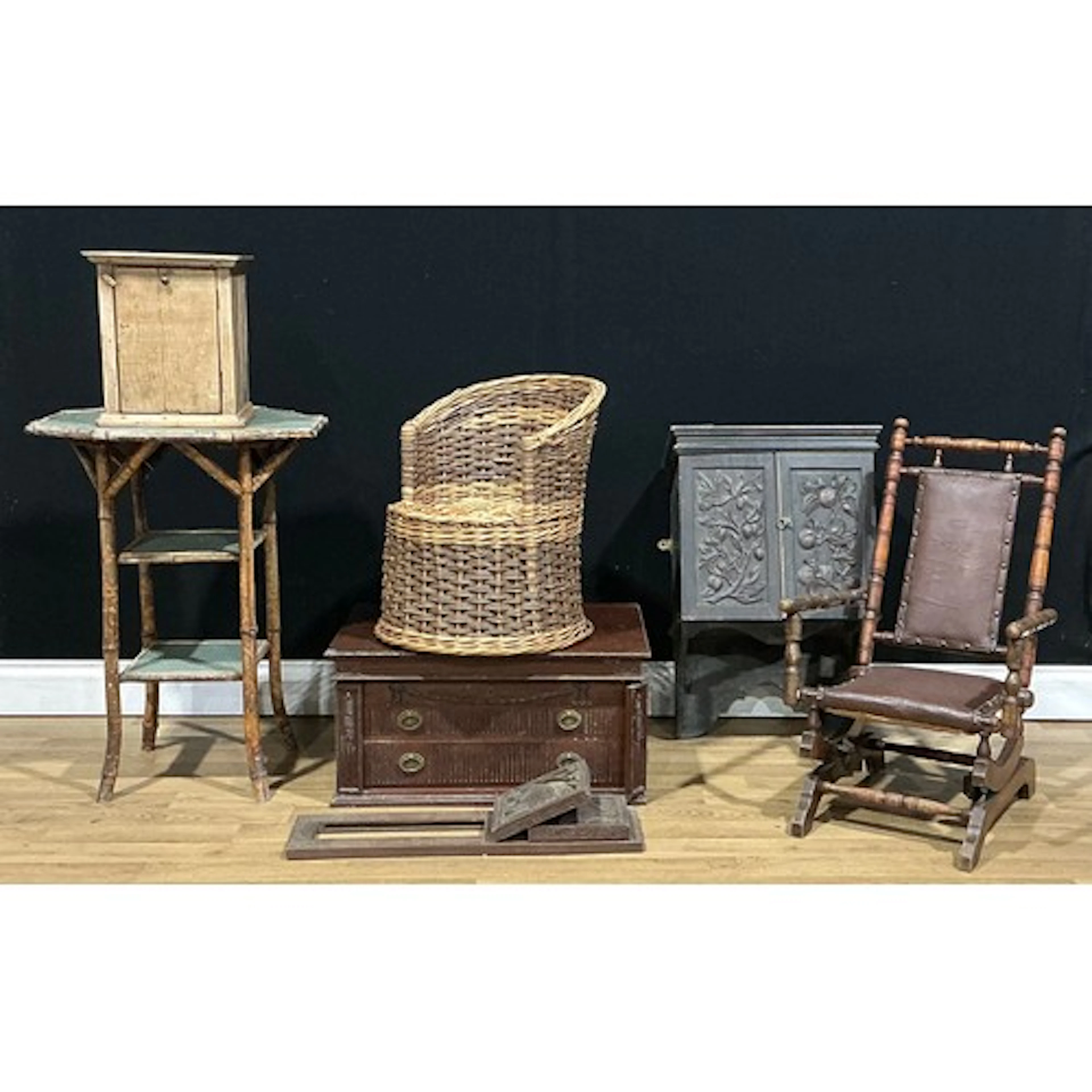 An early 20th century child’s spring rocking chair; an Arts ...