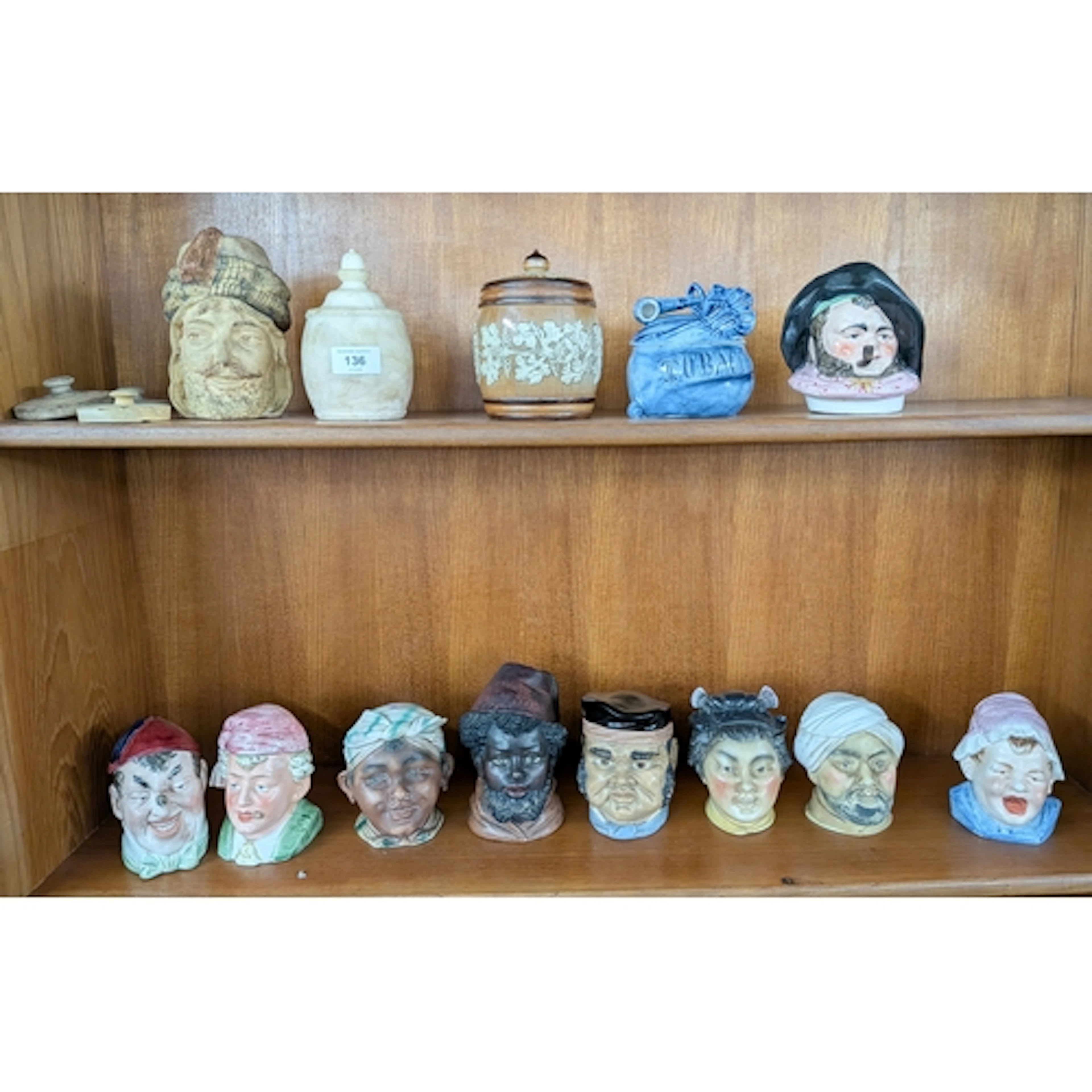 A collection of early 20th century tobacco jars to include D...