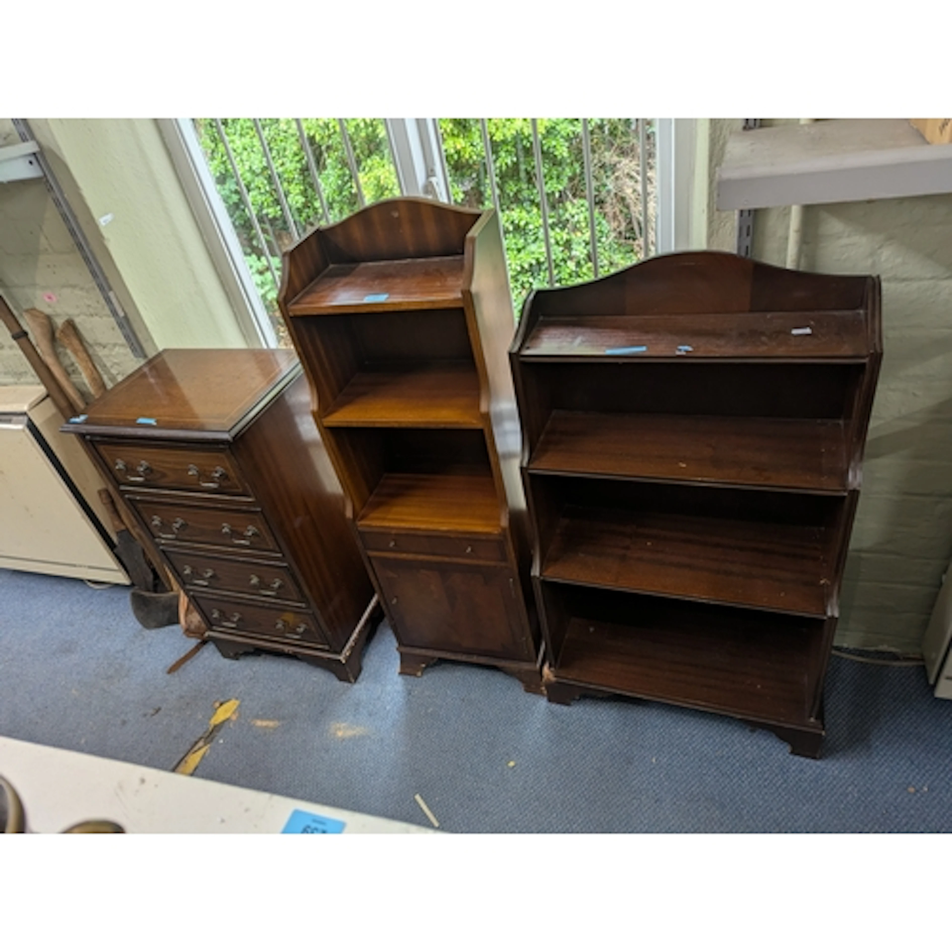 Small modern mahogany furniture to include a waterfall bookc...