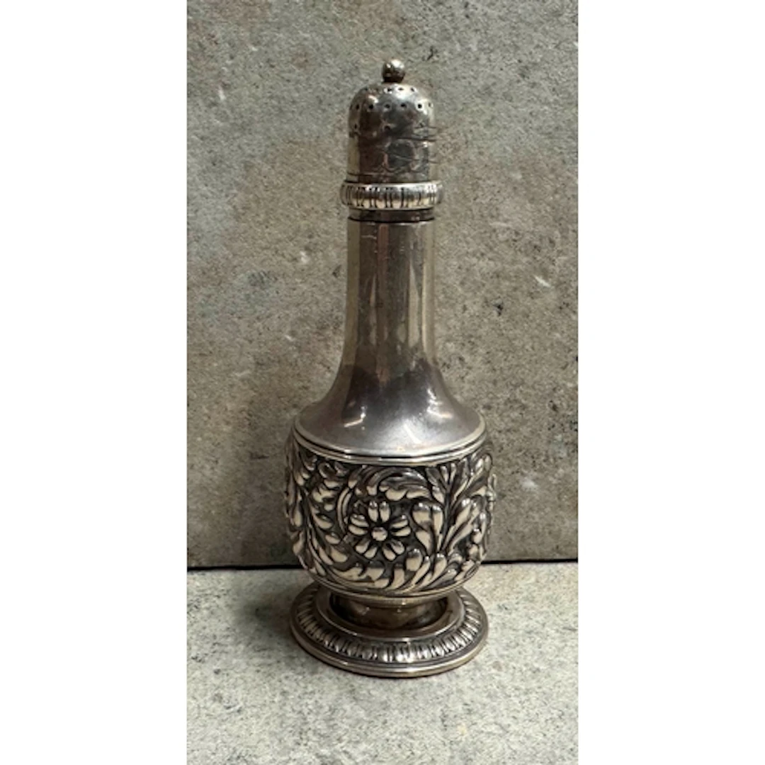TIFFANY AND CO: A silver caster with chased decoration. Appr...