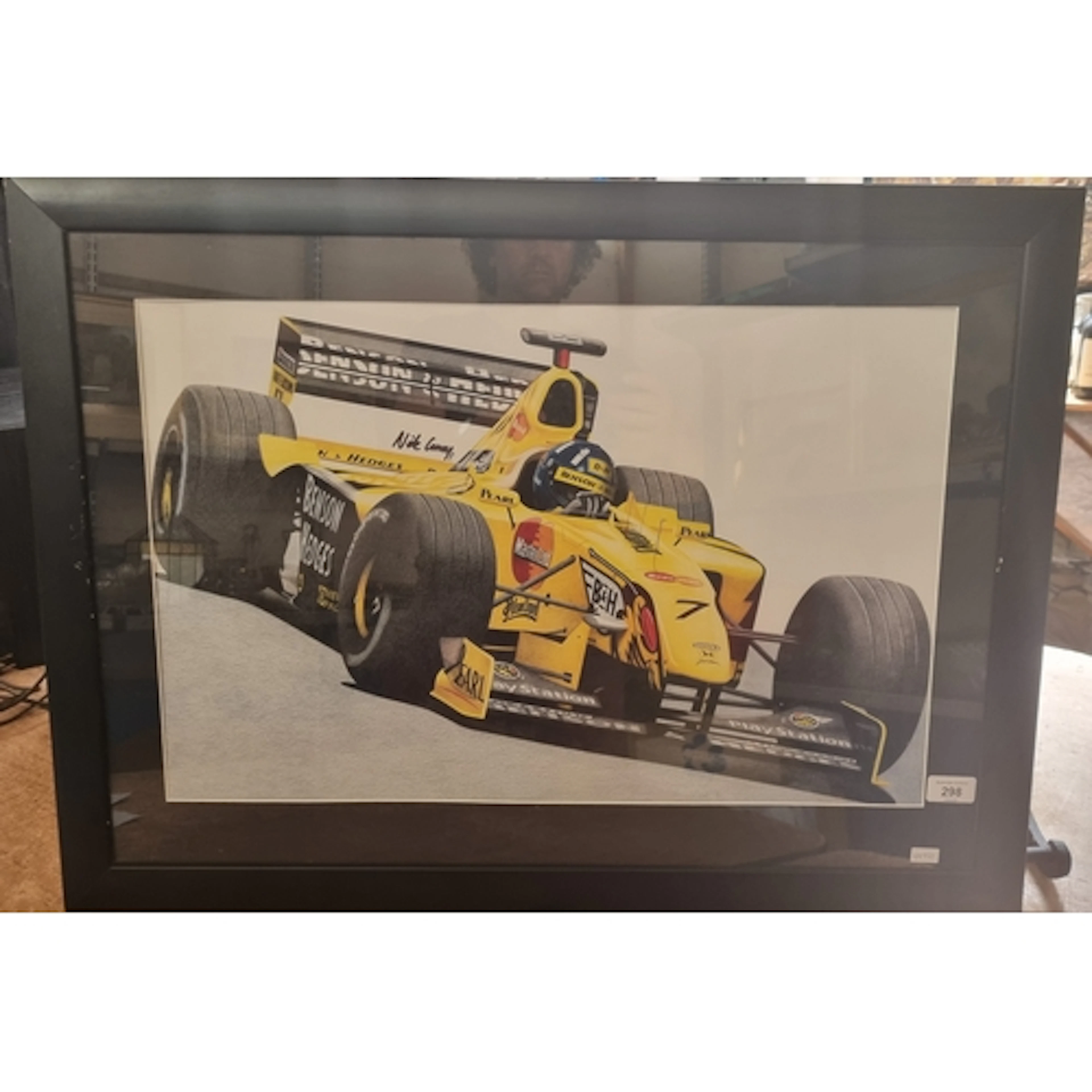 A modern framed print of a racing car, Damon Hill, 1999 seas...