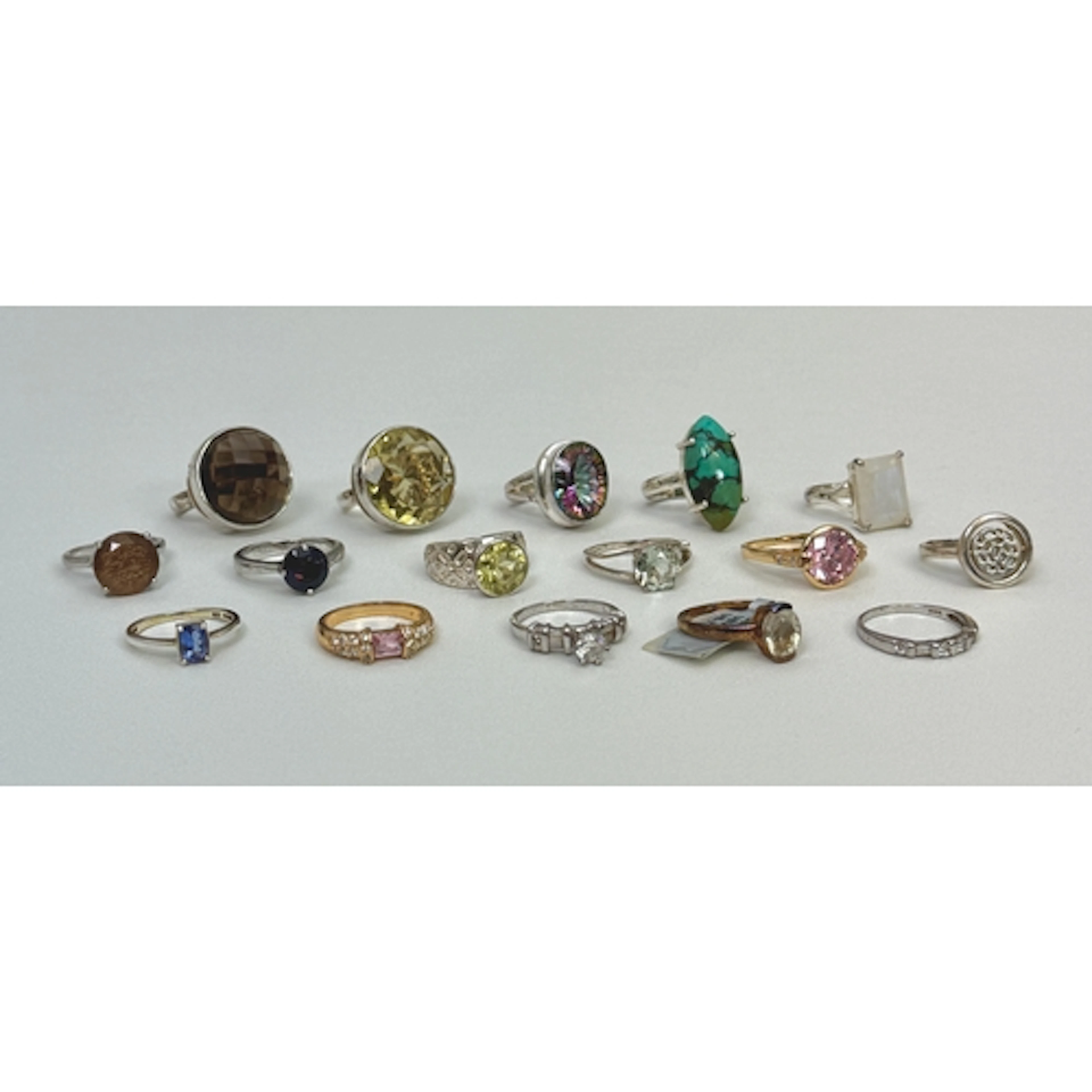 Sixteen sterling silver and silver-gilt rings, most gemstone...