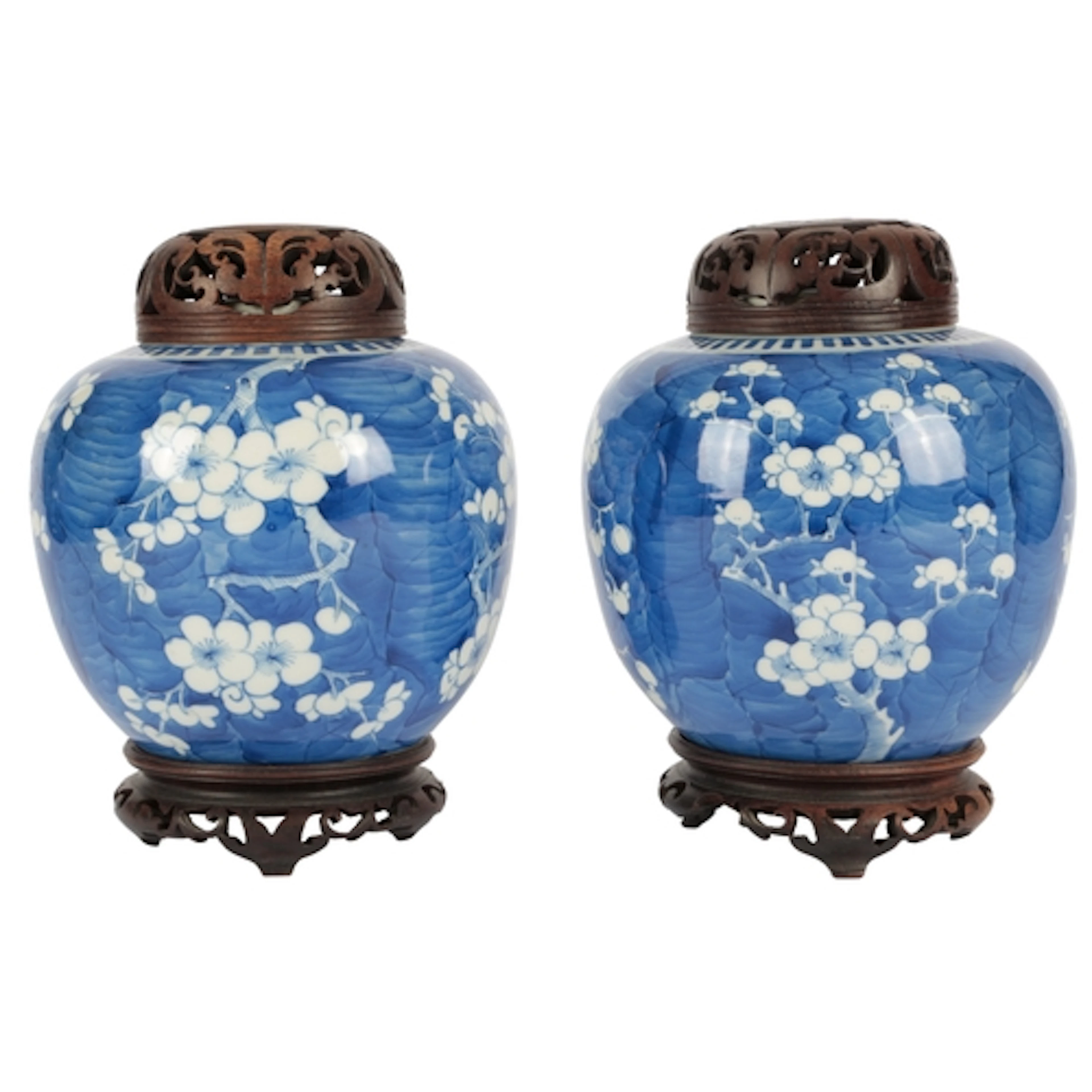 A pair of Chinese blue and white 'prunus and cracked ice' ja...