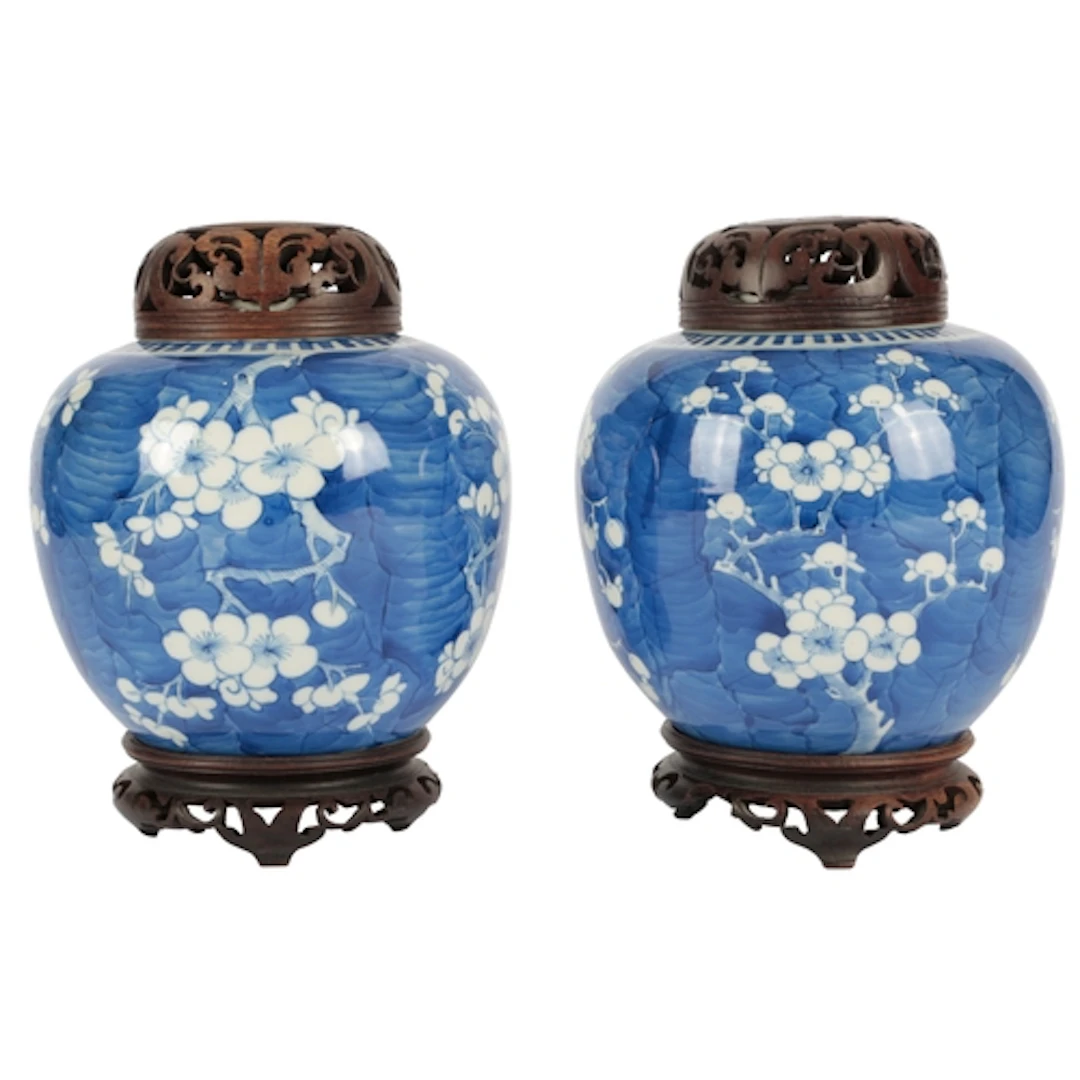 A pair of Chinese blue and white 'prunus and cracked ice' ja...