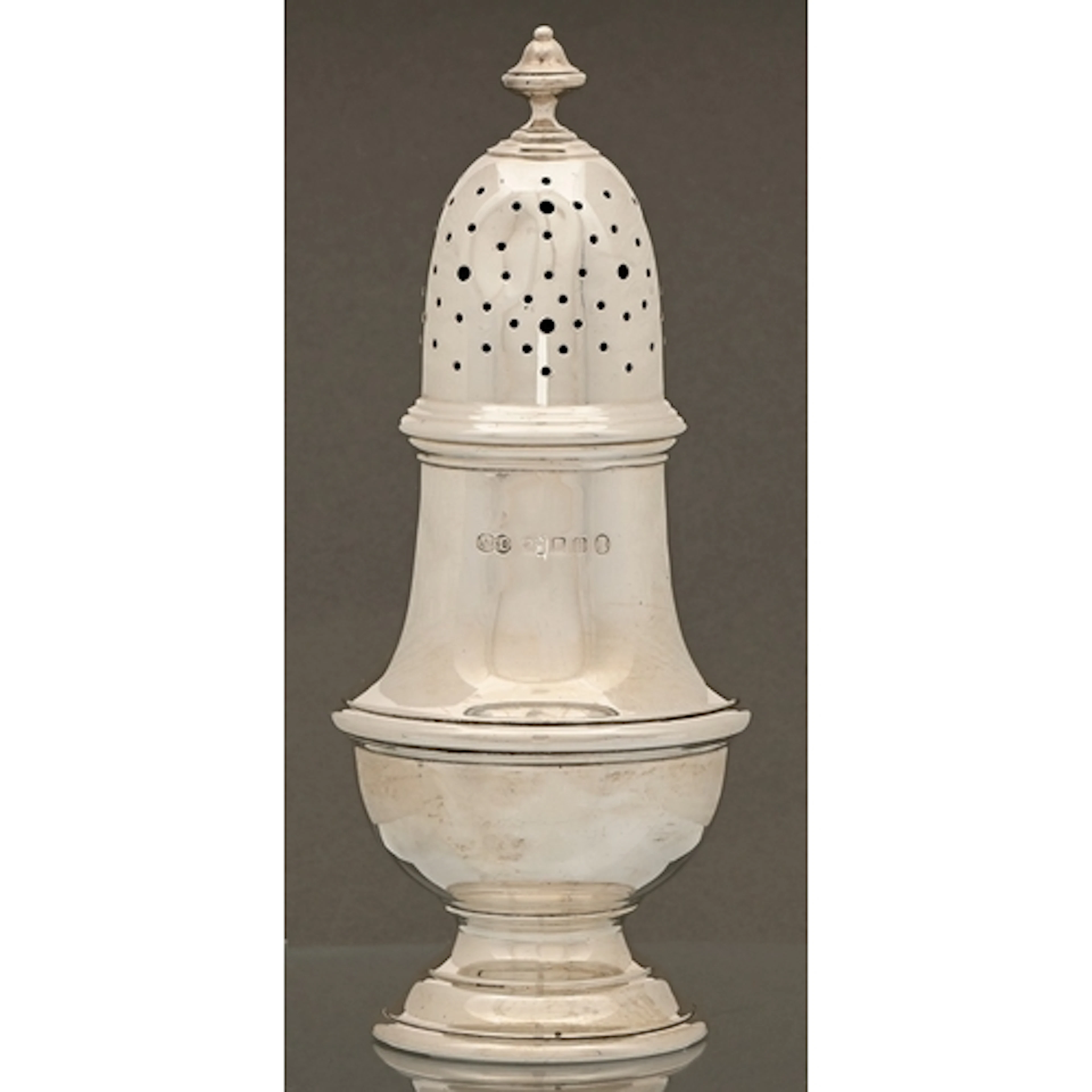 A George V silver sugar caster, 18cm h, by Munsey & Co o...