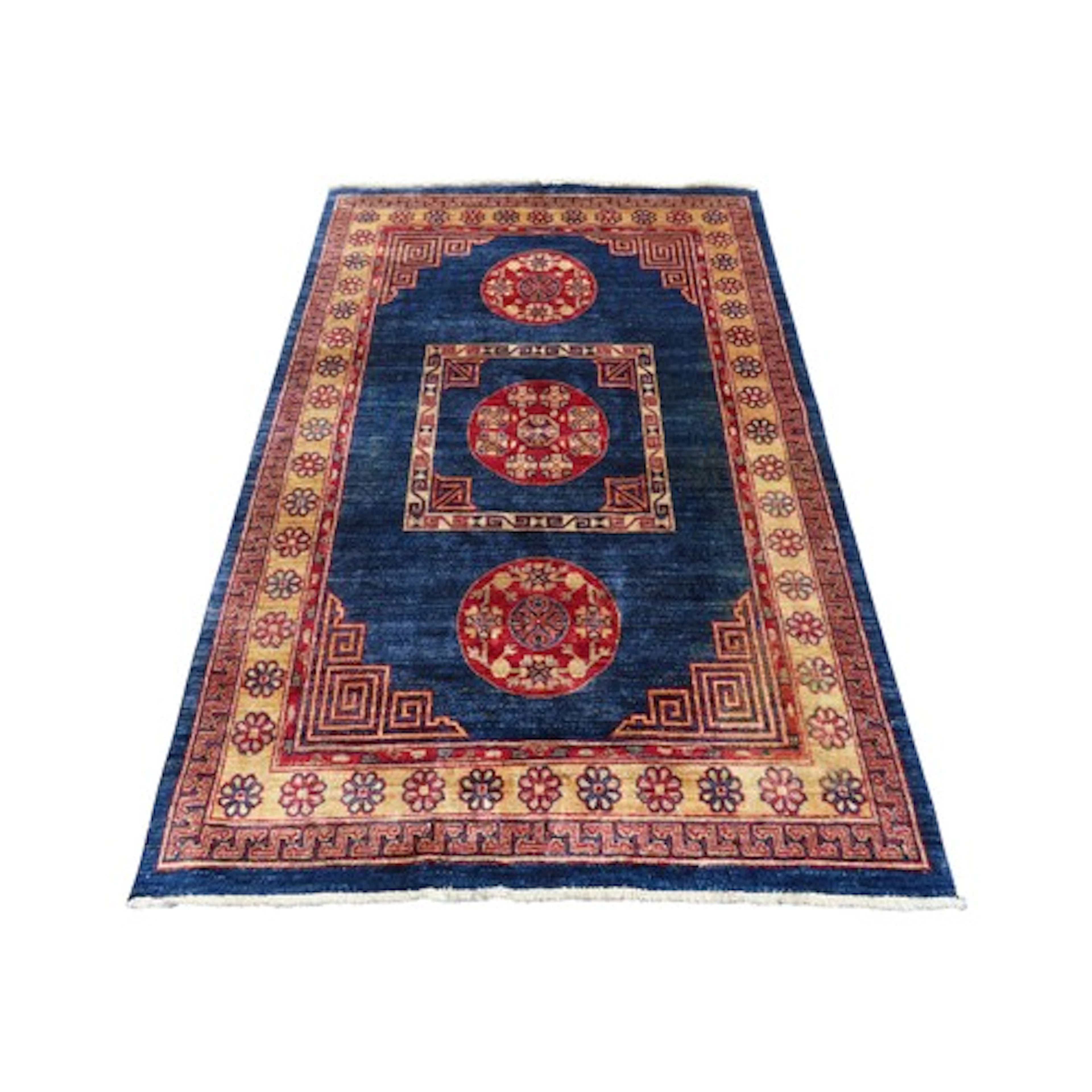 A Fardian Tibetan design rug with a blue field with Tibetan ...