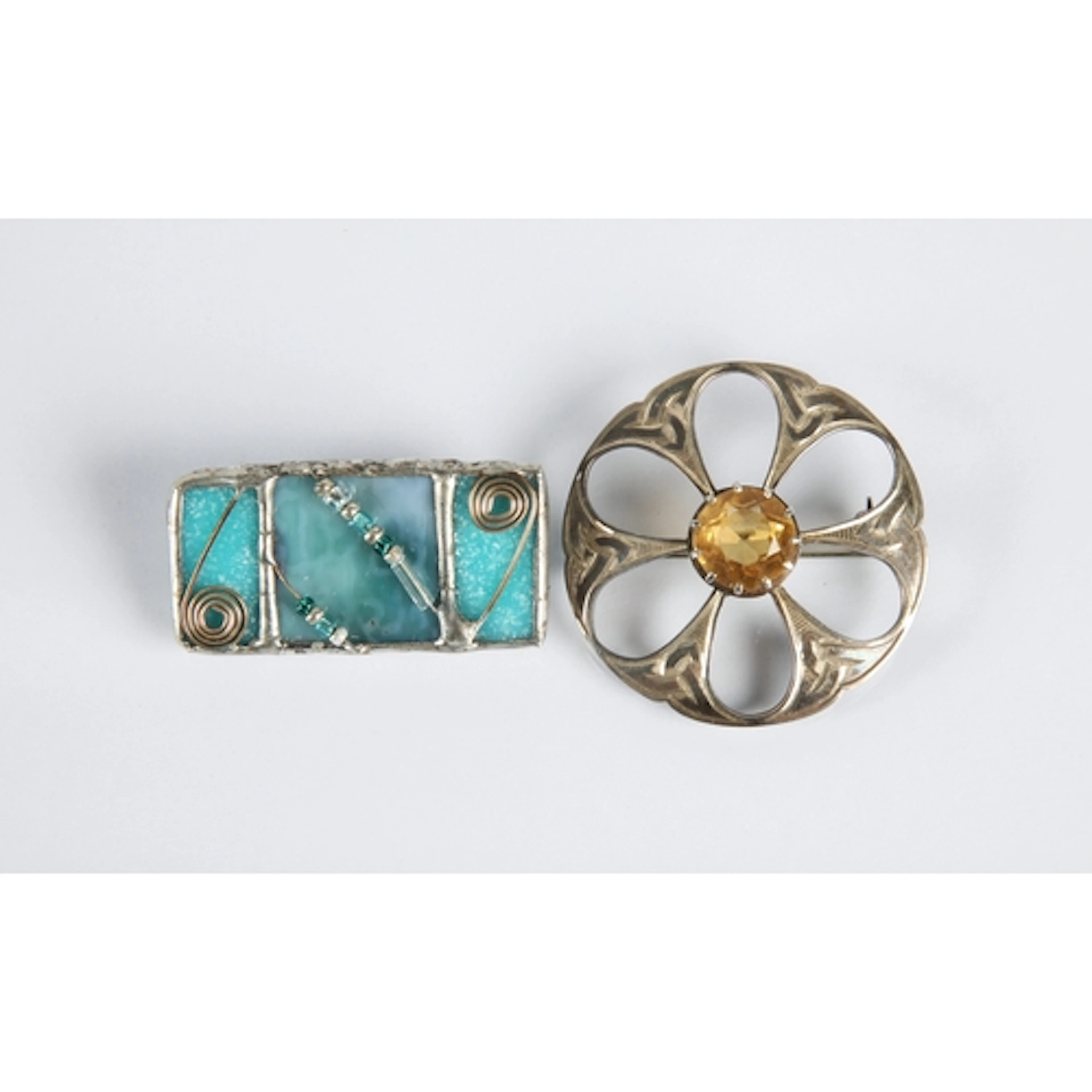 Iona silver Celtic brooch, with another. (2)