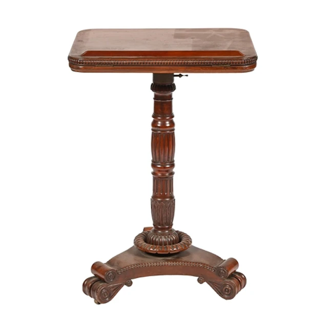 A George IV mahogany reading stand, with adjustable top and ...